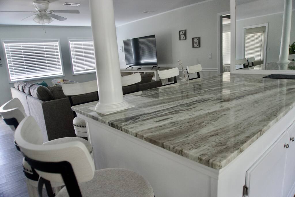 2 Full Kitchens and Dining Areas