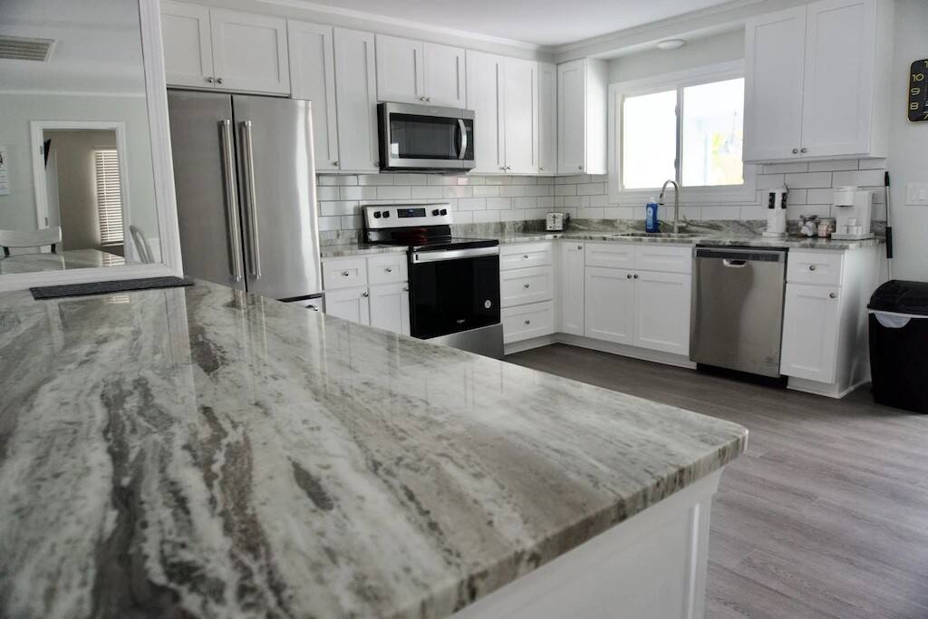 2 Full Kitchens and Dining Areas