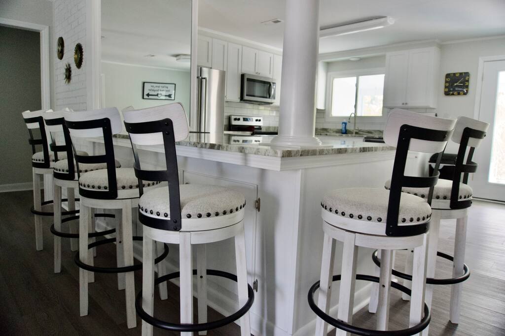 2 Full Kitchens and Dining Areas