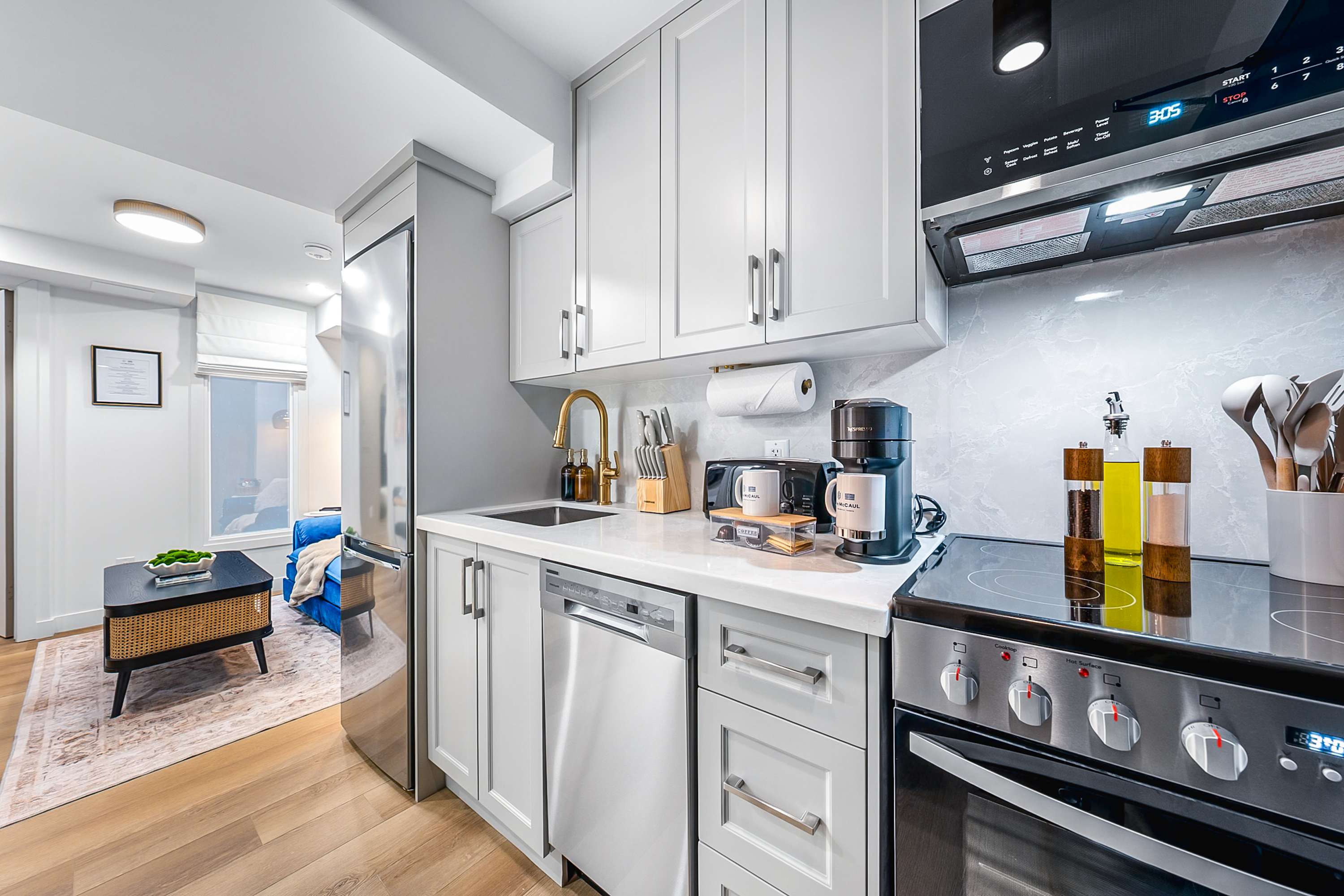 Fully equipped kitchen with modern appliances.