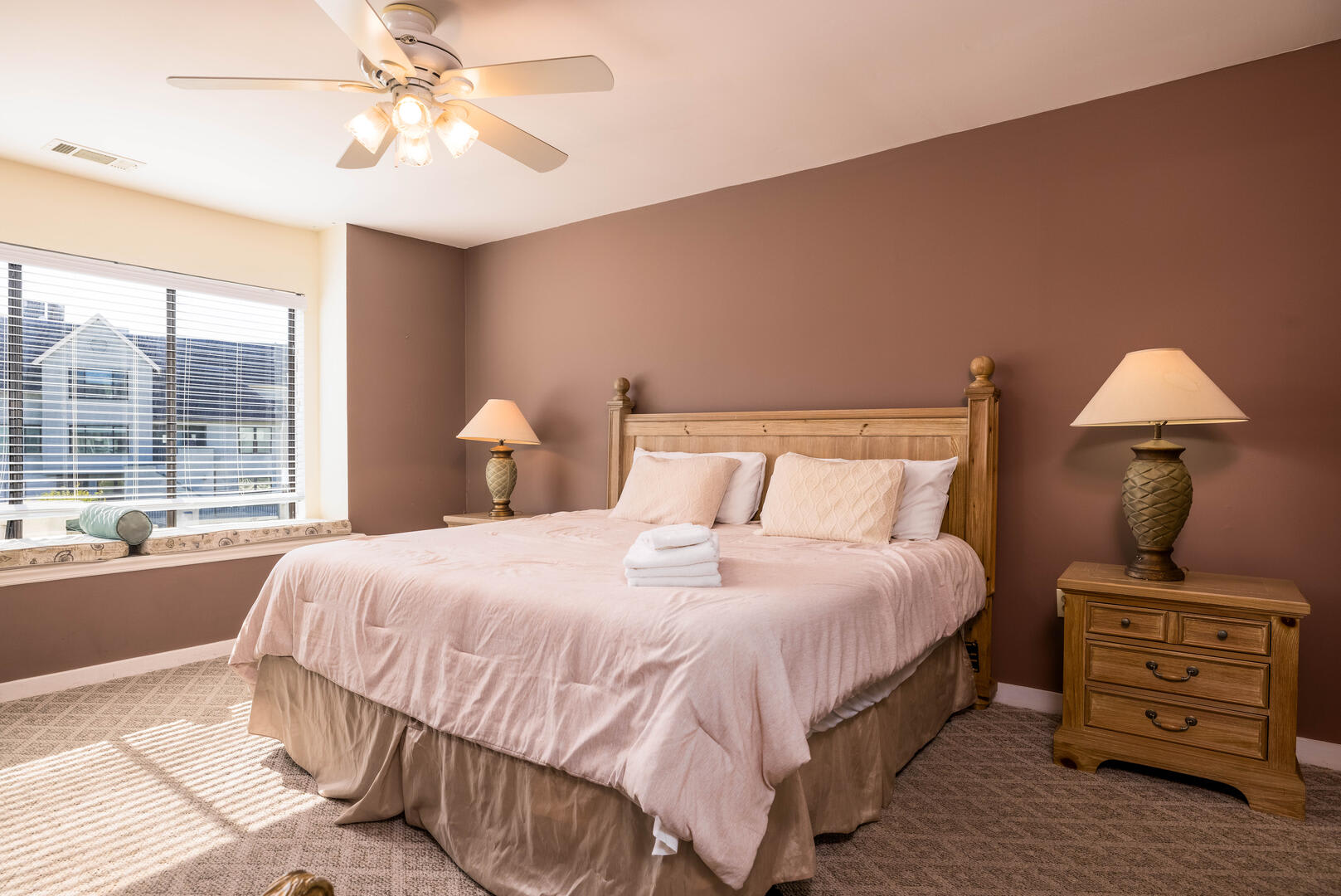First floor primary bedroom with en suite bathroom