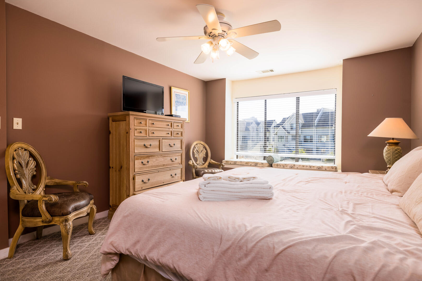 First floor primary bedroom with en suite bathroom