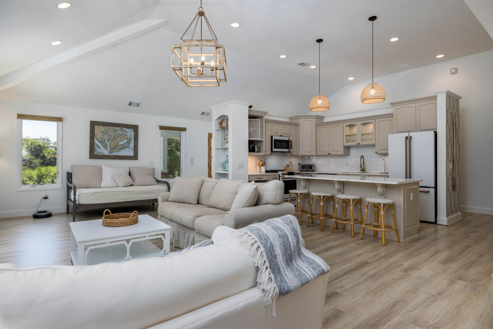 Open concept living room, dining room, and chef's kitchen.