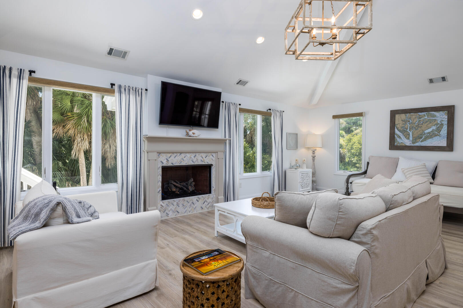 Open concept living room, dining room, and chef's kitchen.