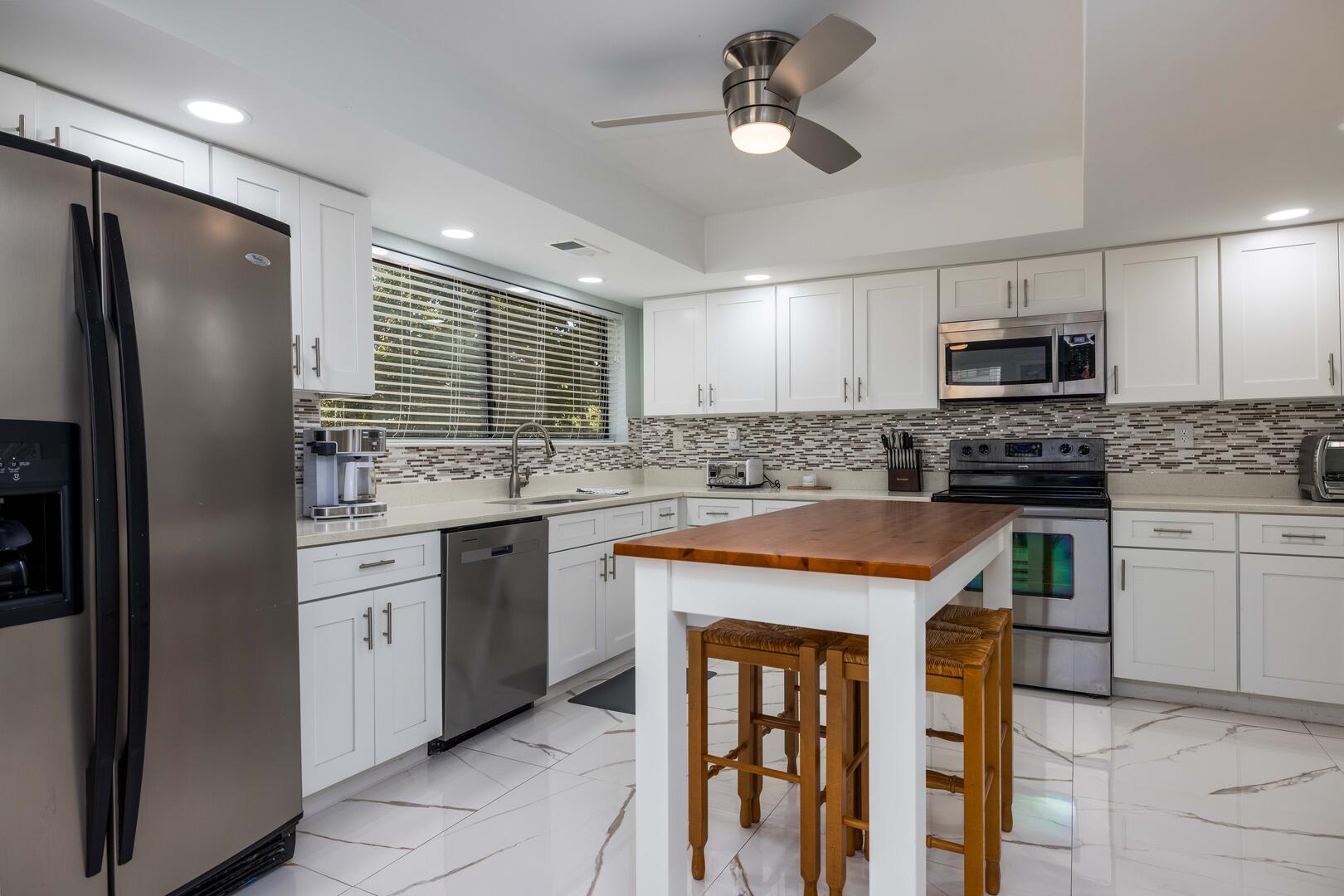 Large kitchen with island and eat in area