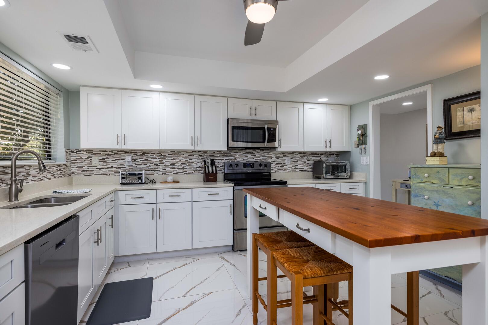 Large kitchen with island and eat in area