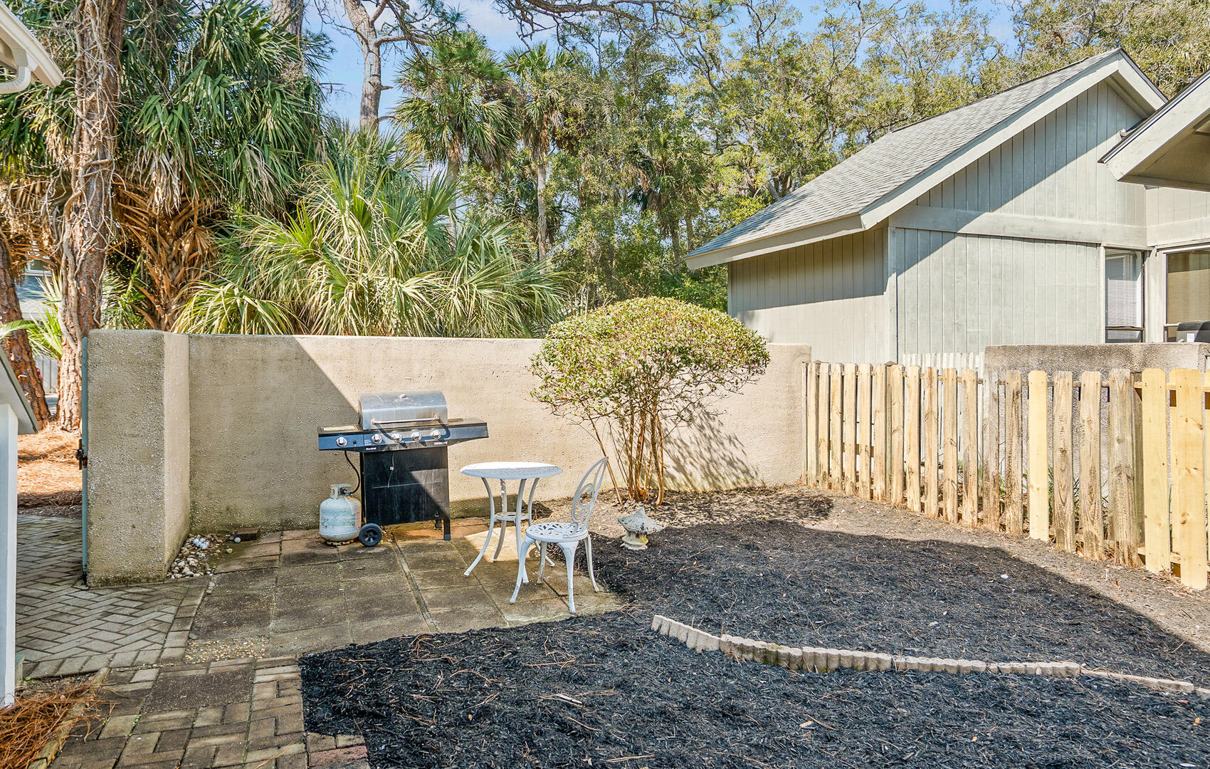 Fenced-in side courtyard