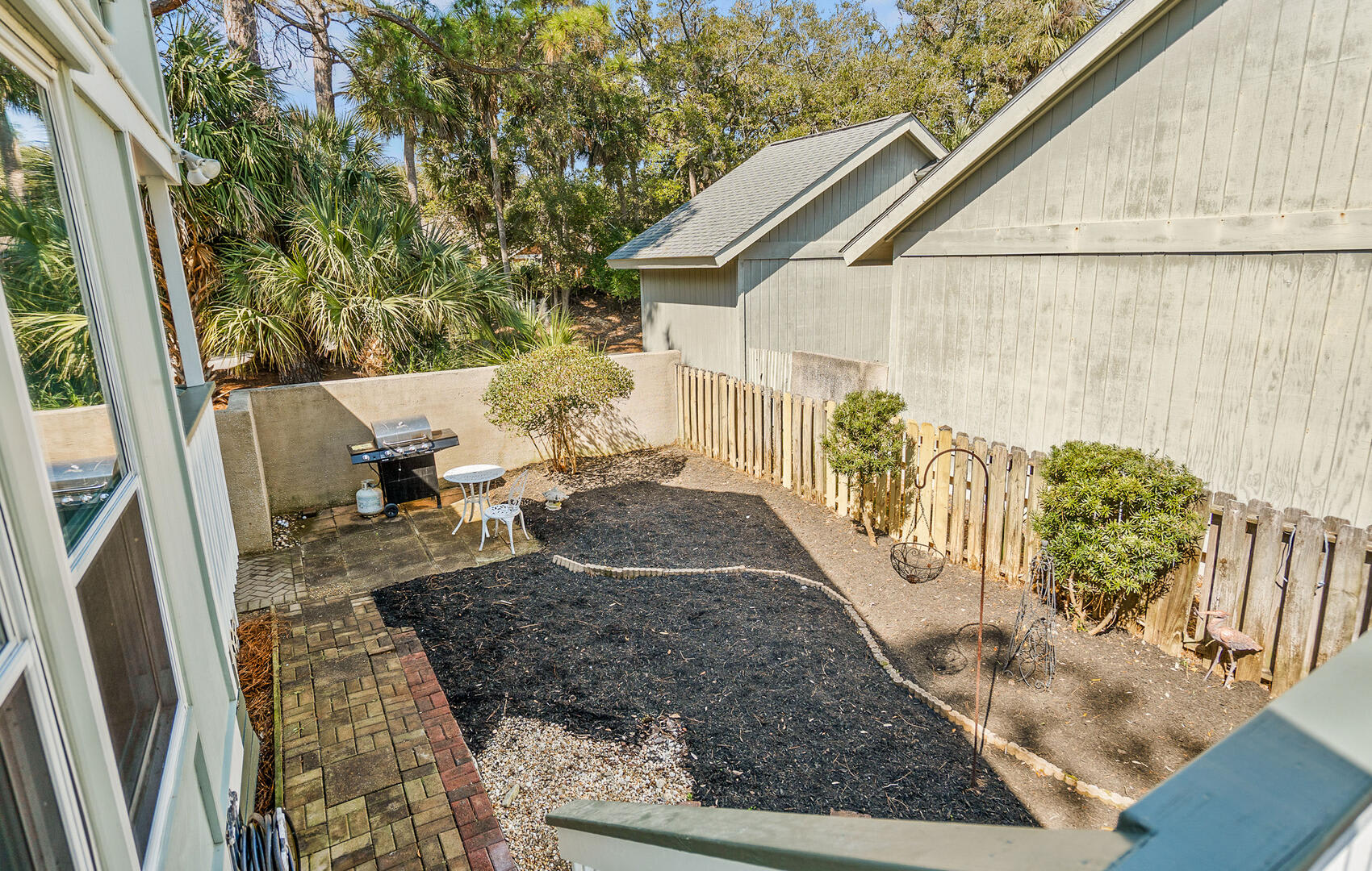 Fenced-in side courtyard