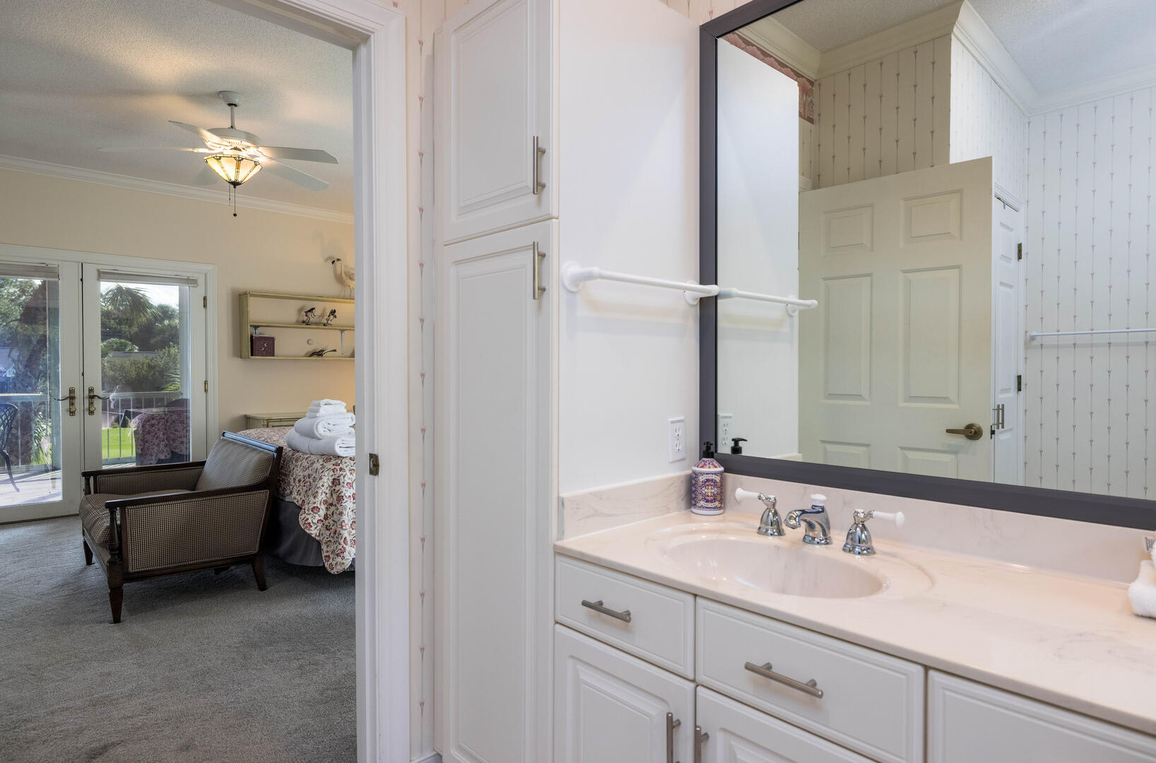 First floor primary bedroom with en suite bathroom