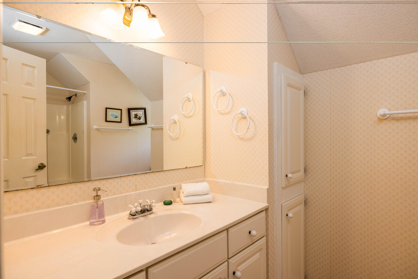 Second floor guest bedroom with en suite bathroom. Please note that bunk bedroom is off of this bedroom.