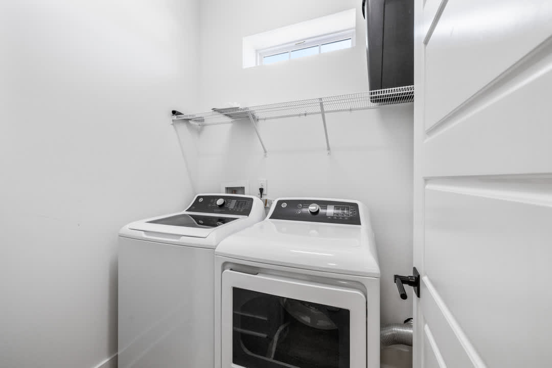 Two Sets of Washers and Dryers (1 Set on Each Side of Home)
