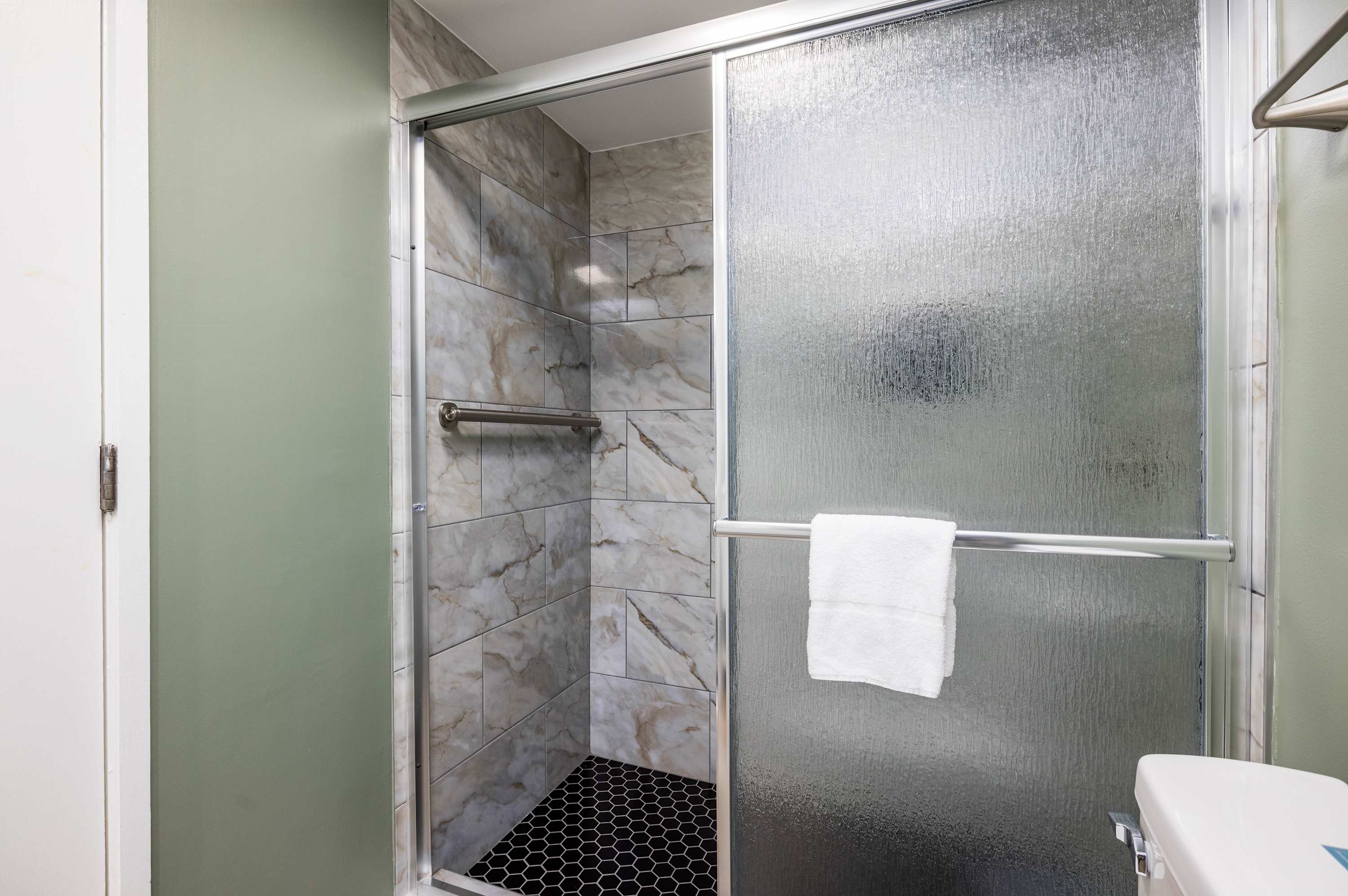 Fully Renovated Primary Bathroom with Walk-In Shower 
