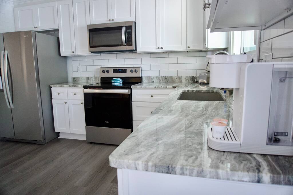 2 Full Kitchens and Dining Areas