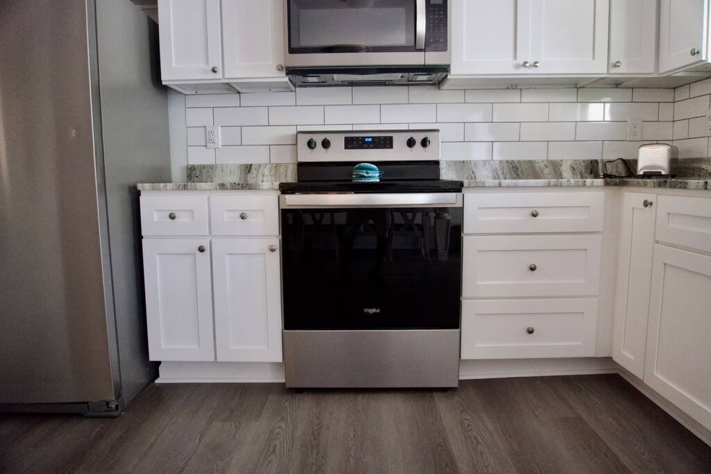 2 Full Kitchens and Dining Areas