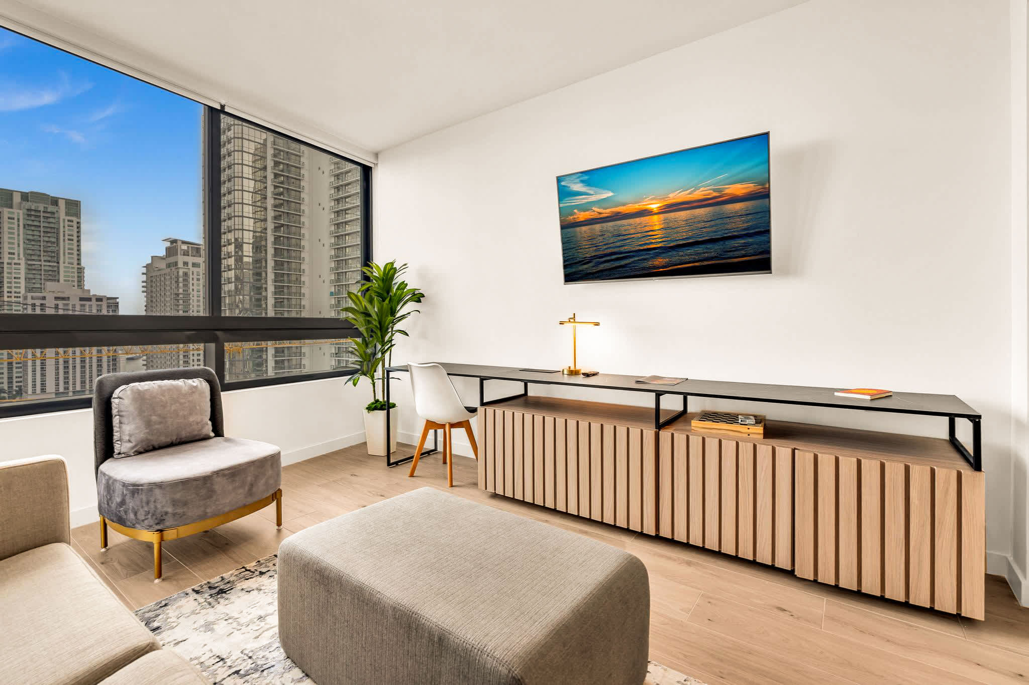 Enjoy stunning city views from this stylish and modern living space, perfect for relaxation or work.