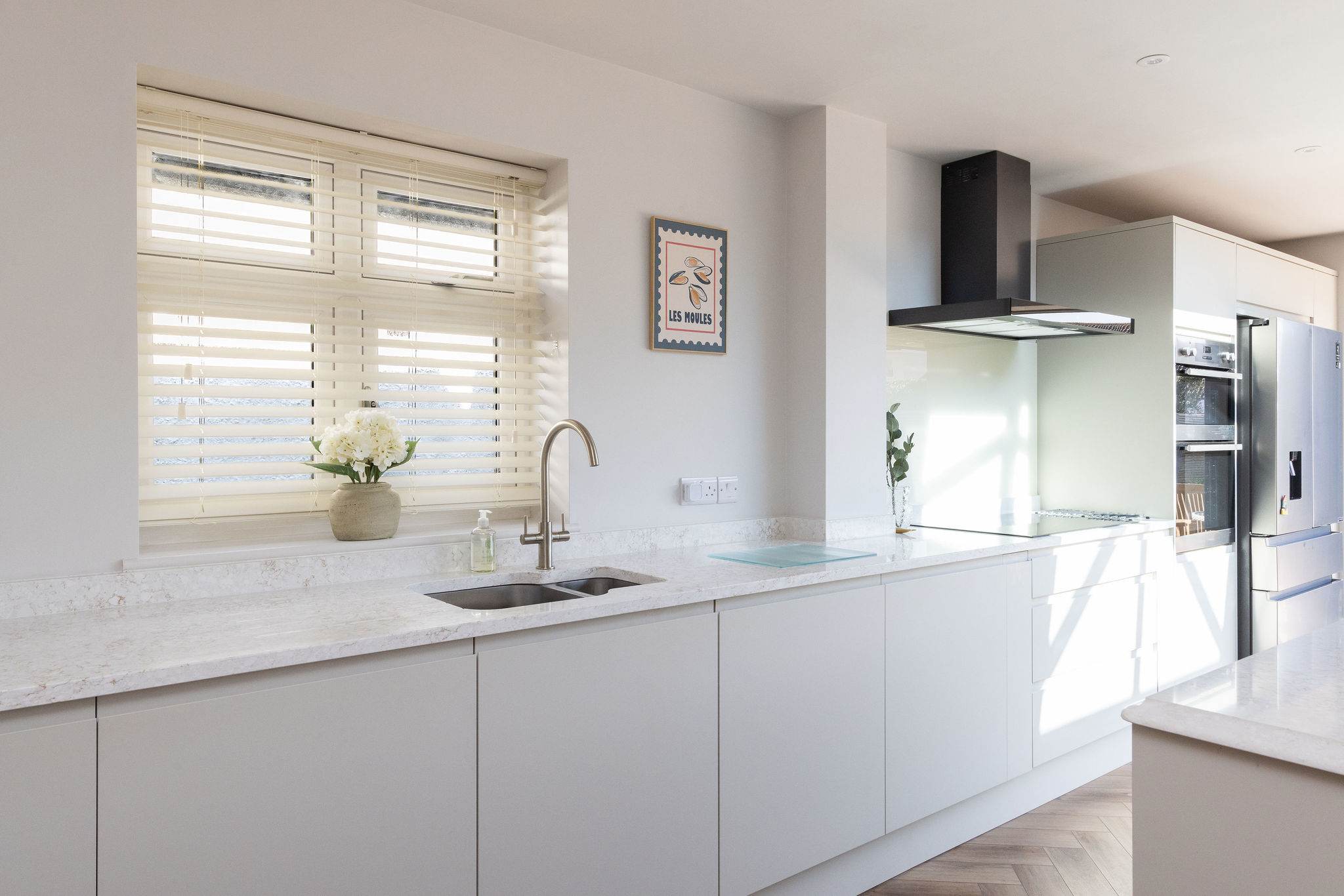 Modern coastal bungalow with bright interiors, high-end kitchen, and a relaxed, welcoming atmosphere throughout.