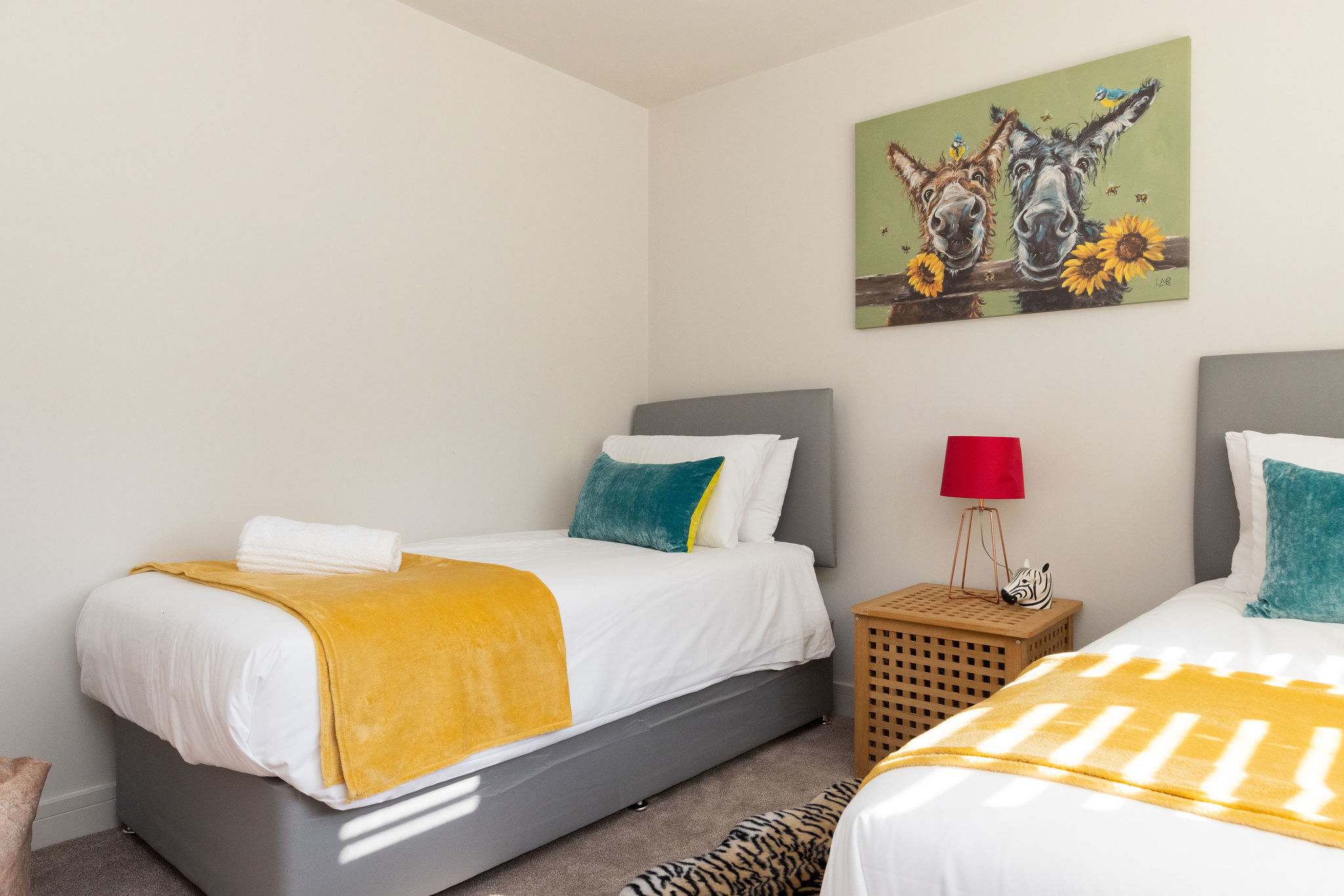 Bright and welcoming interiors with versatile bedrooms, perfect for families or friends sharing by the sea.