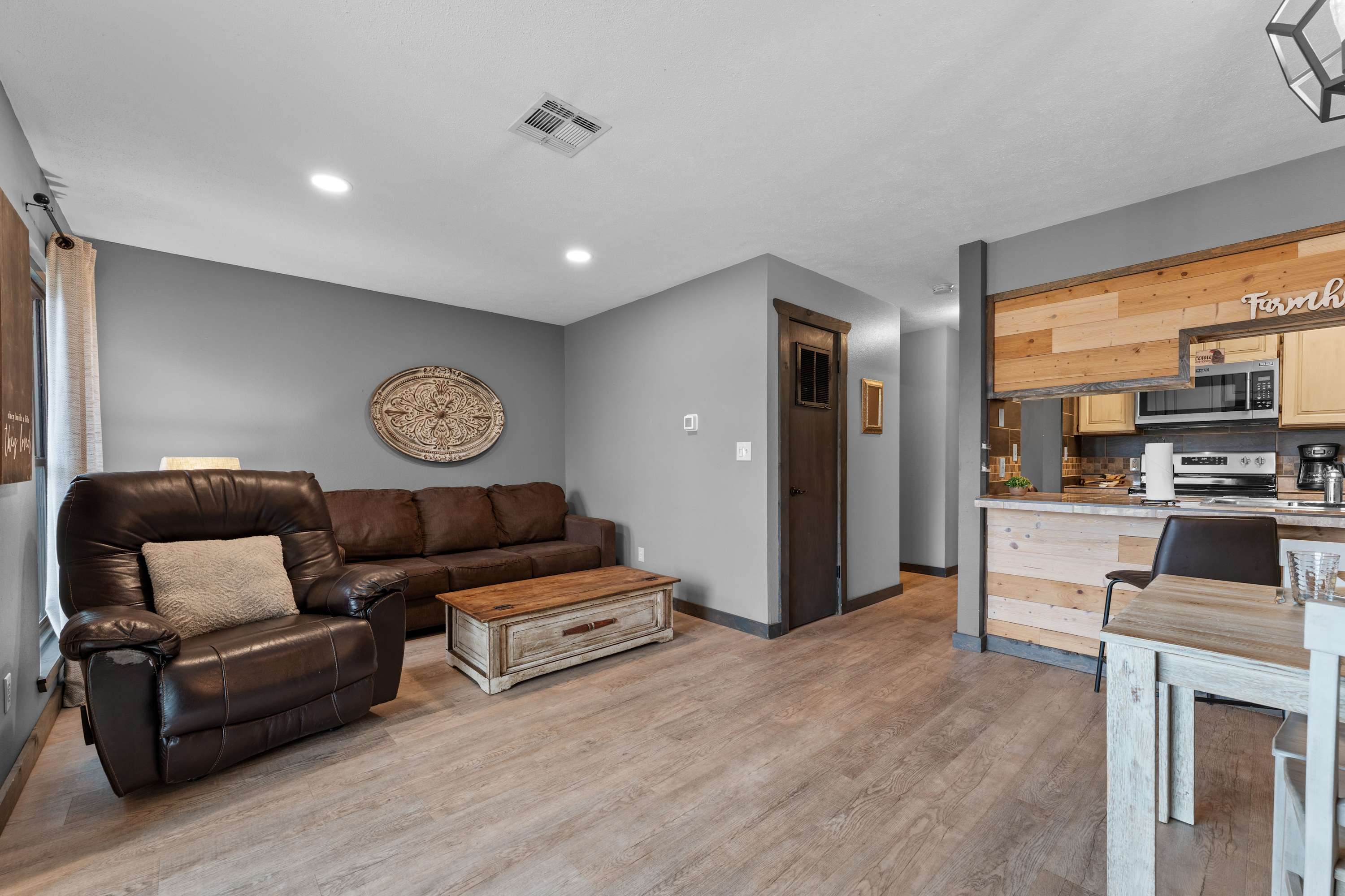 Curl up in the cozy living room & stream your favorites on the smart TV​