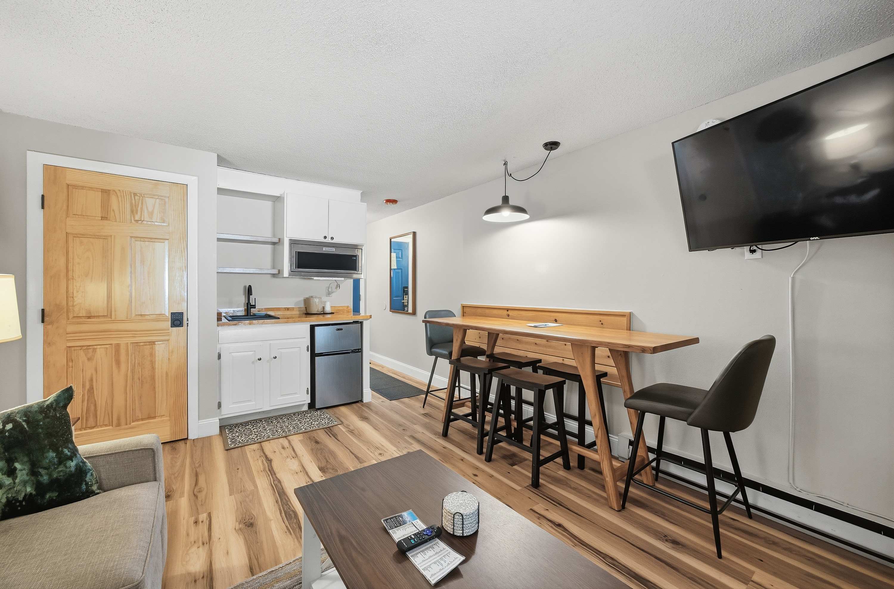 Unwind in the inviting main living space & enjoy a movie night at home​