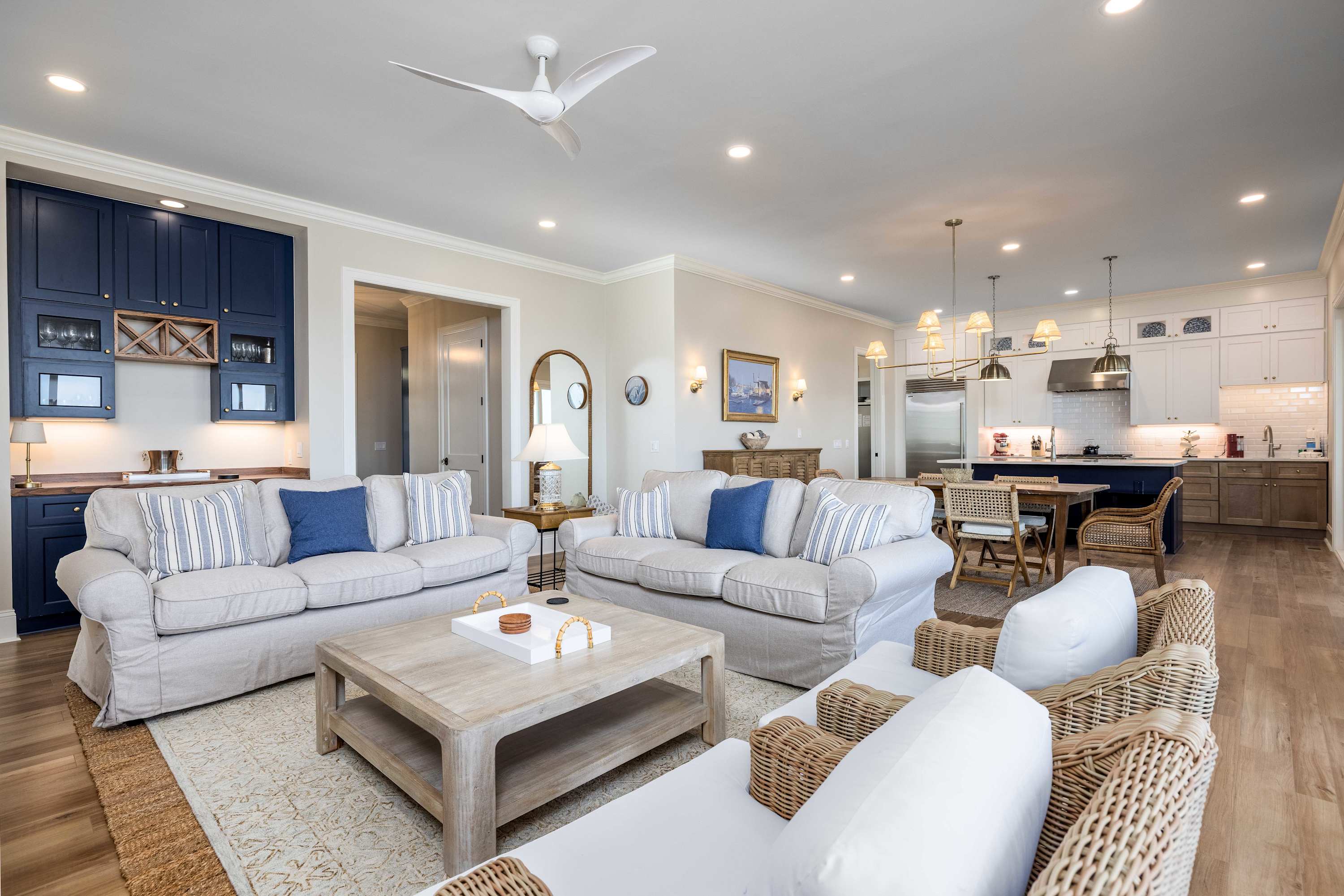 Open Concept Living, Dining and Kitchen Areas with Access to Decks