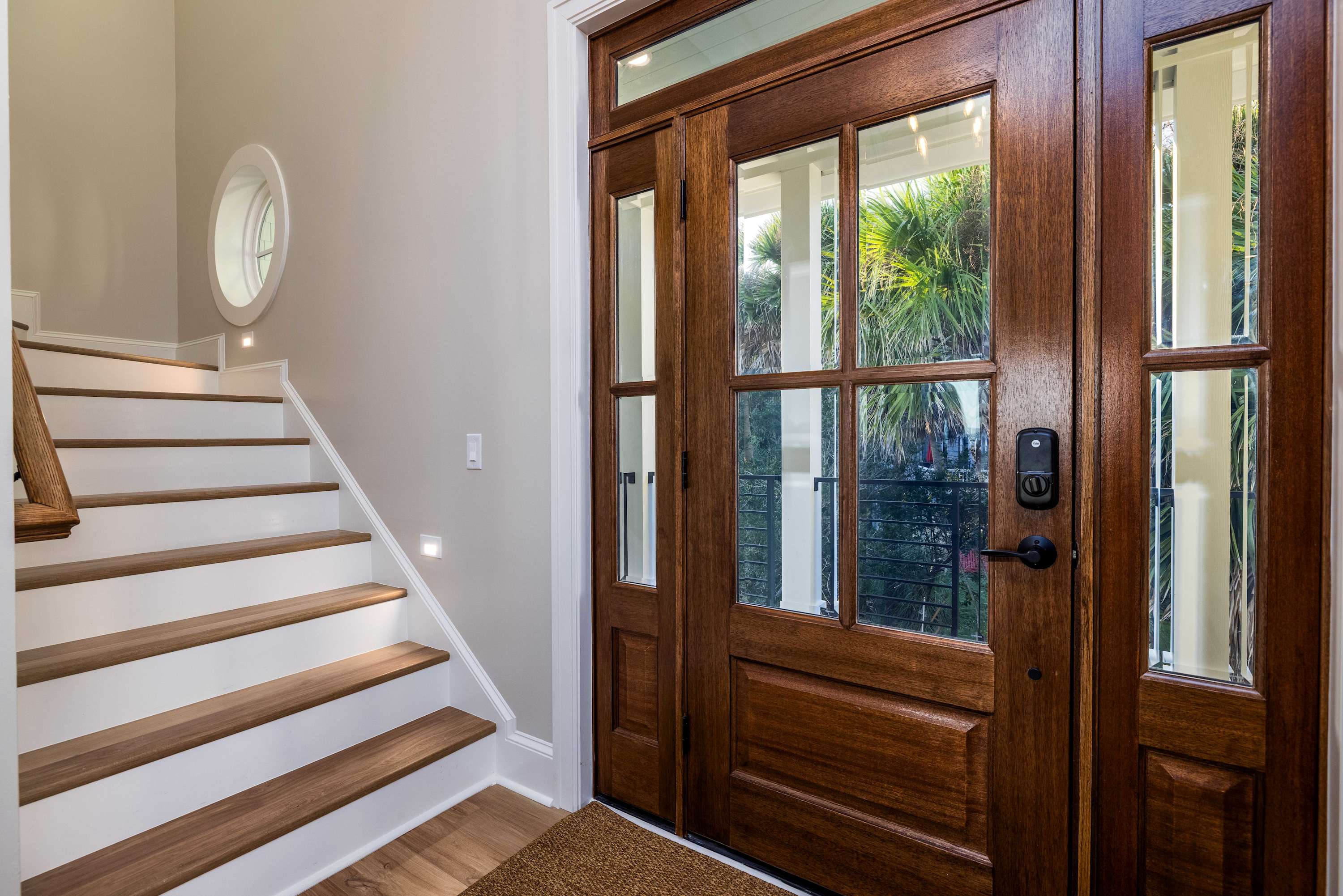 Front Door and Staircase Leading to 2nd Level