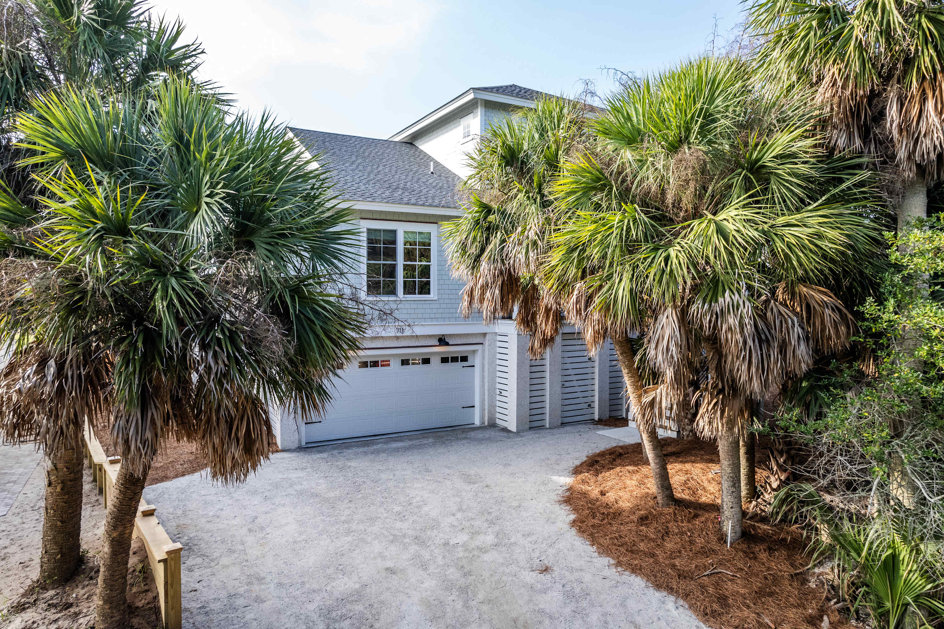 Front of the House with Garage and 4 Parking Spaces