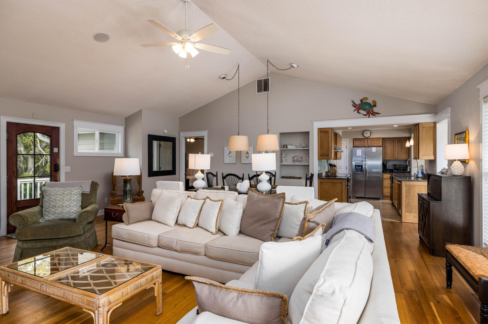 Open Concept Living Room with Dining Area and Access to the Deck