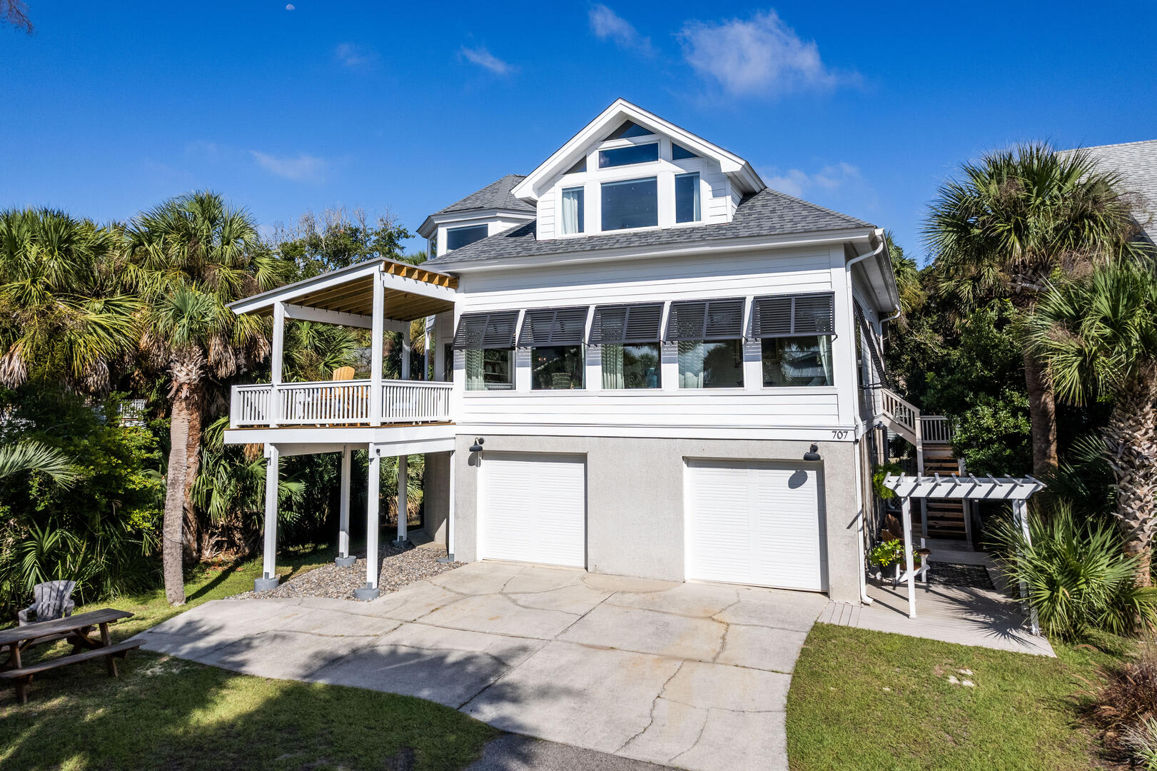 Front of the House with Garage and 4 Parking Spaces
