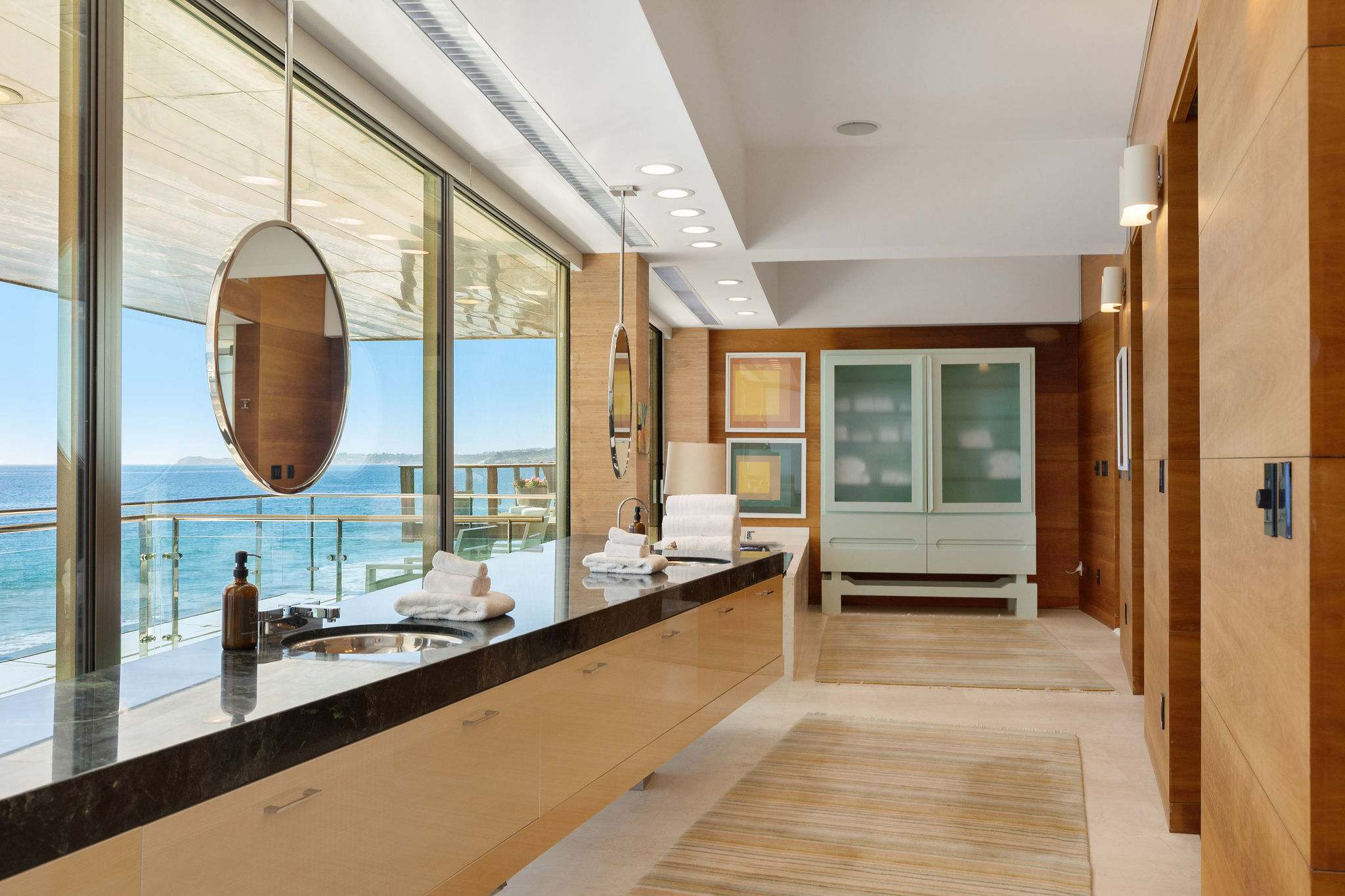 Spa-style Malibu bathroom with soaking tub and Pacific ocean views.