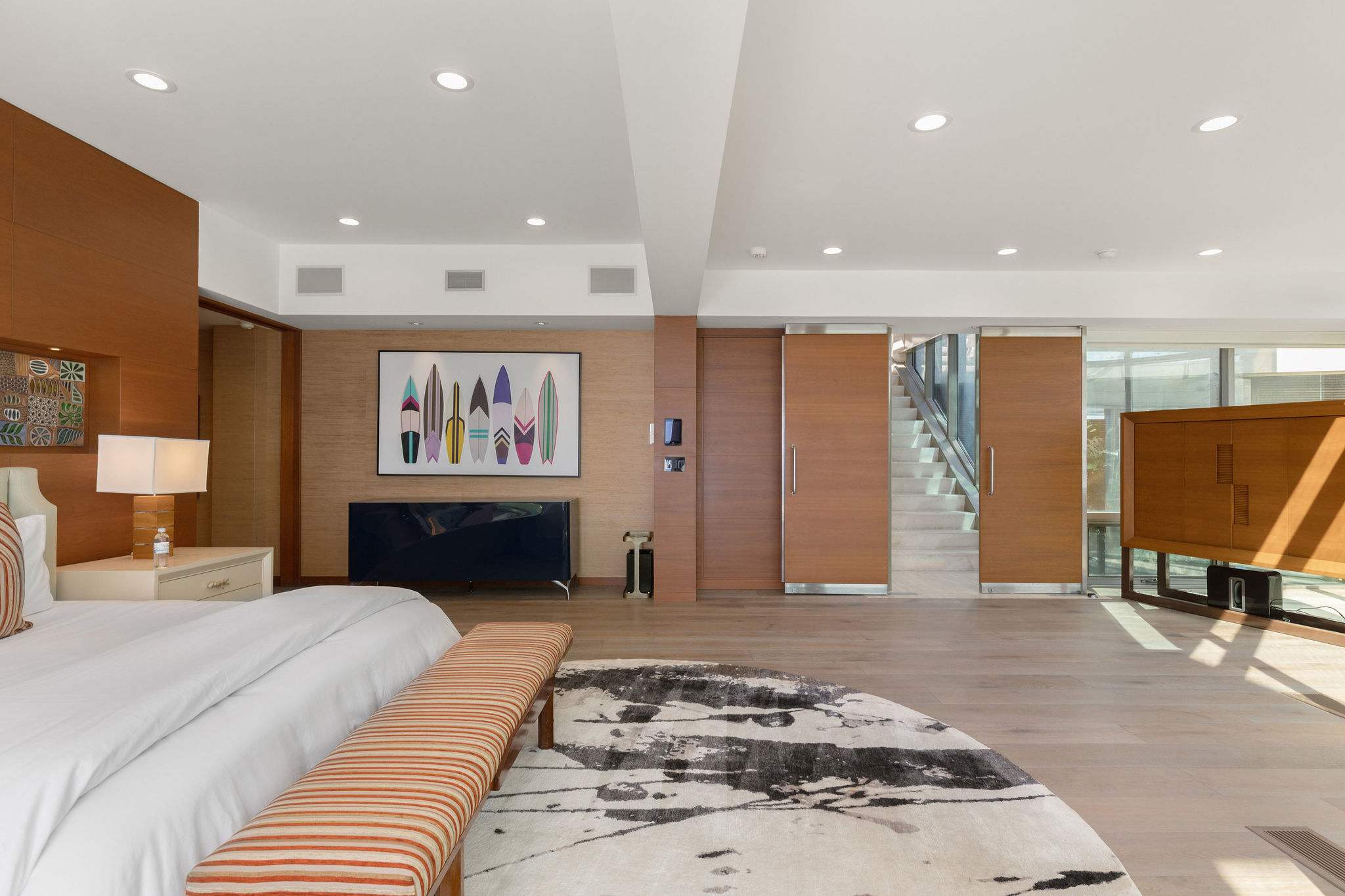 Spacious bedroom suite within this Malibu oceanfront luxury residence.