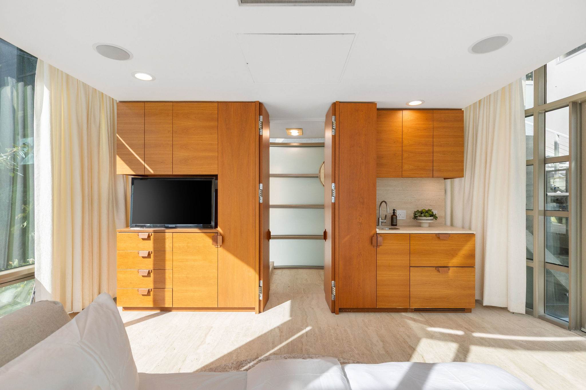 Guest bedroom inside a contemporary Malibu beachfront estate.