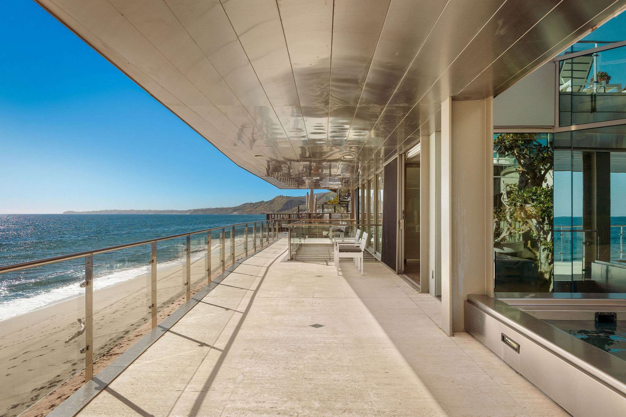 Expansive oceanfront terrace along Malibu’s iconic coastline.