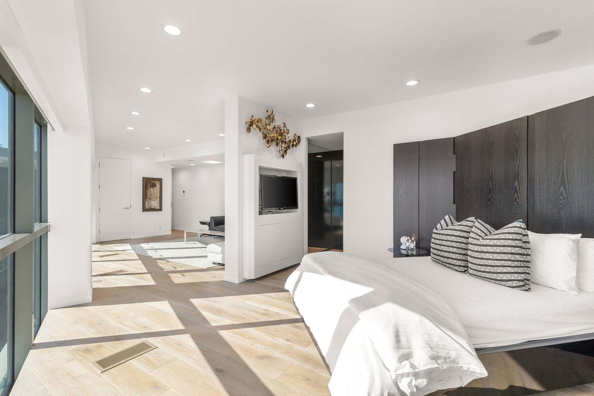 Contemporary bedroom suite within the luxury Malibu residence.