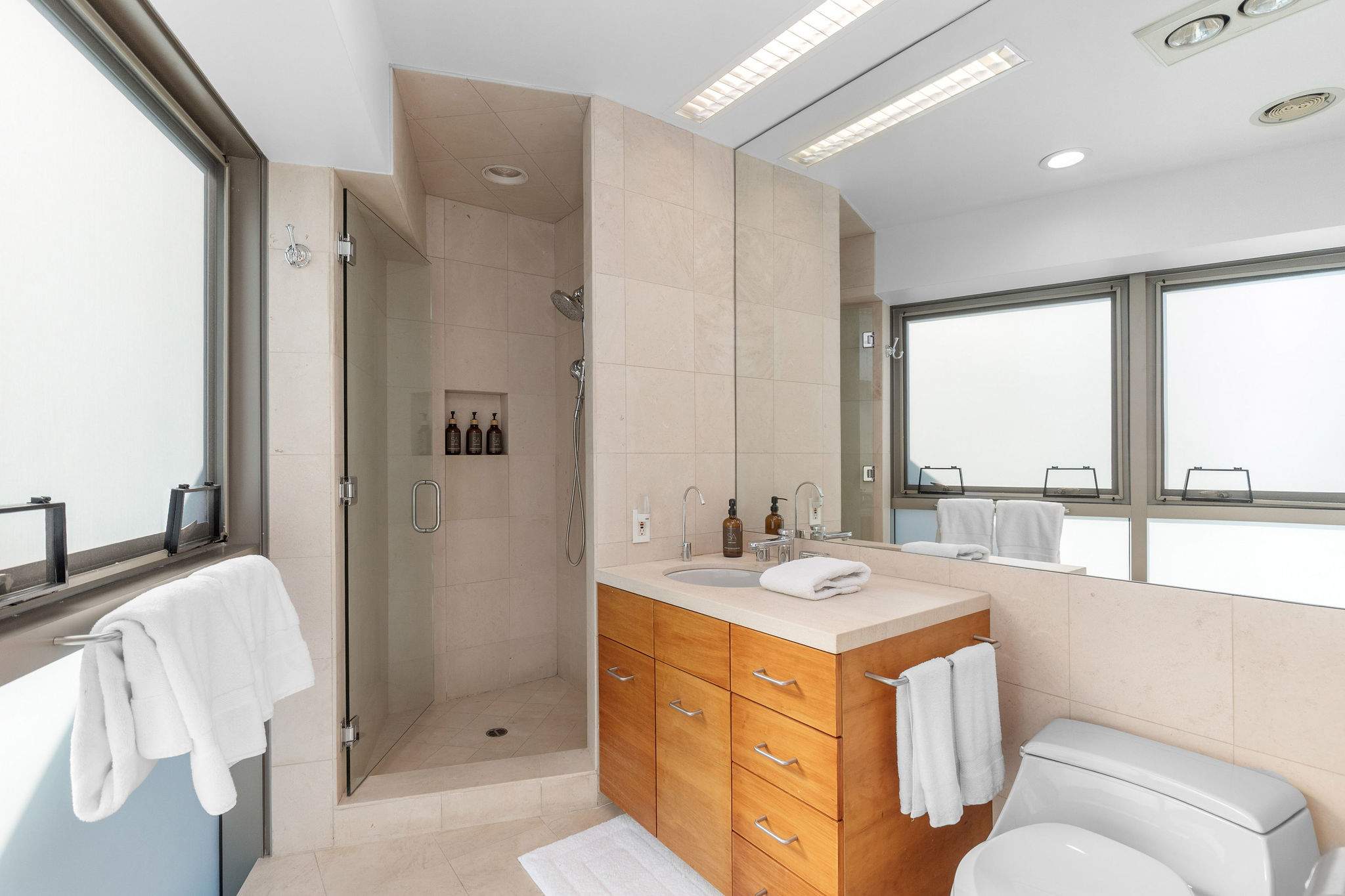 Luxury Malibu bathroom with soaking tub and walk-in shower.