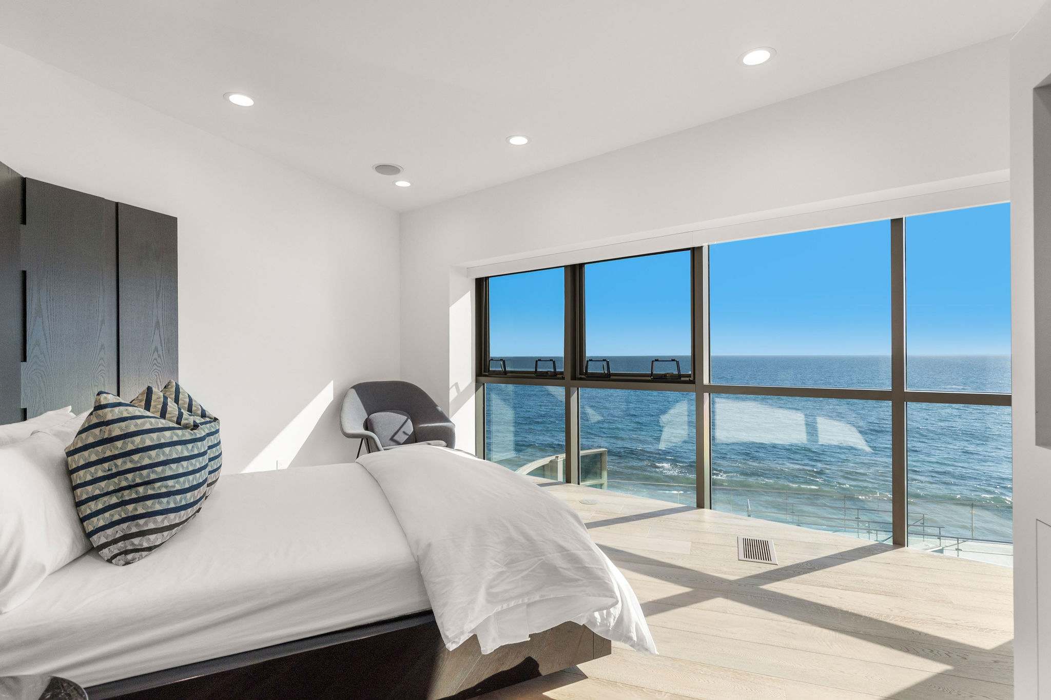 Corner bedroom suite with sweeping Malibu ocean views.
