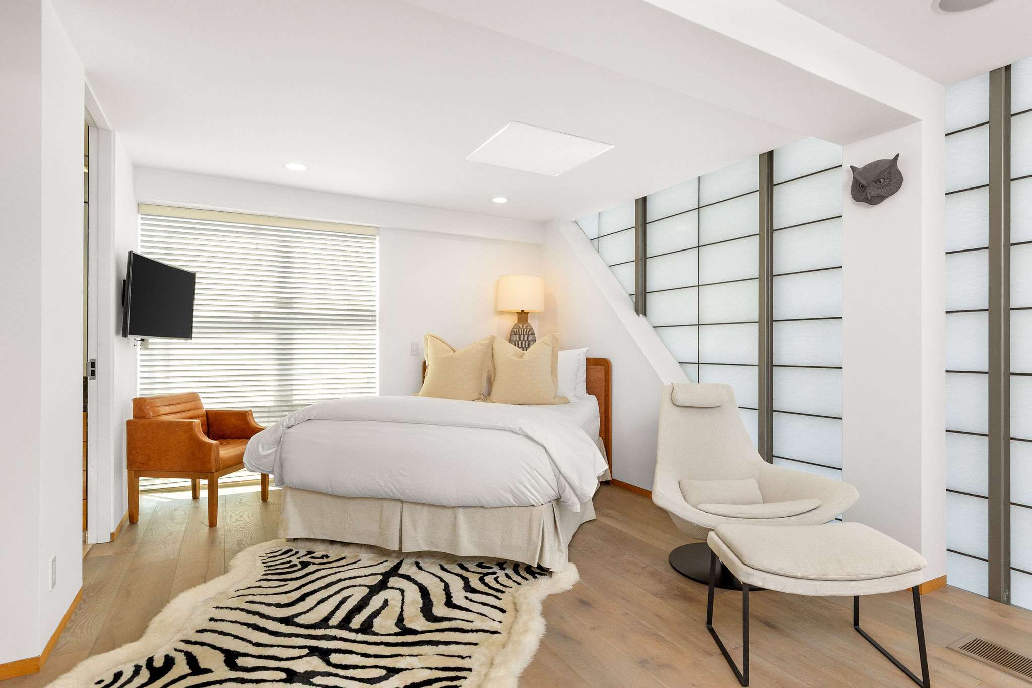 Designer bedroom with modern finishes in a Malibu luxury residence.
