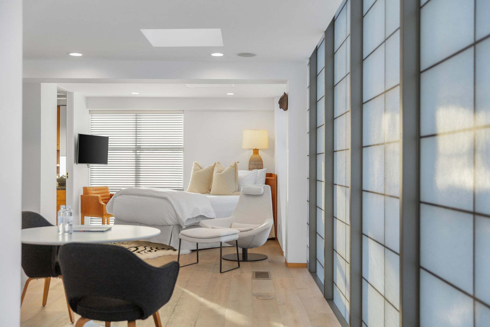 Spacious guest bedroom within this Malibu oceanfront home.