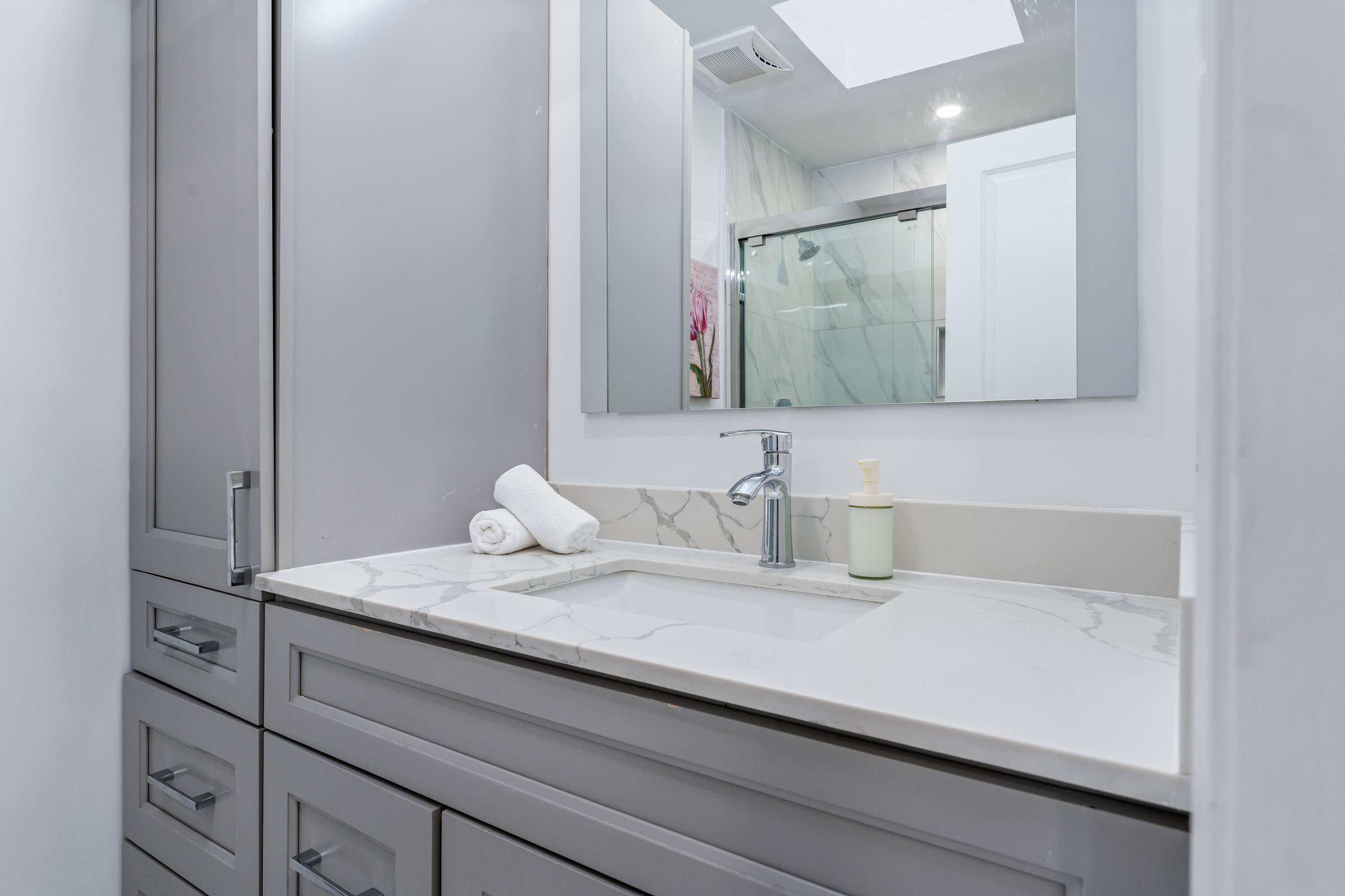Bright bathroom with spacious vanity.