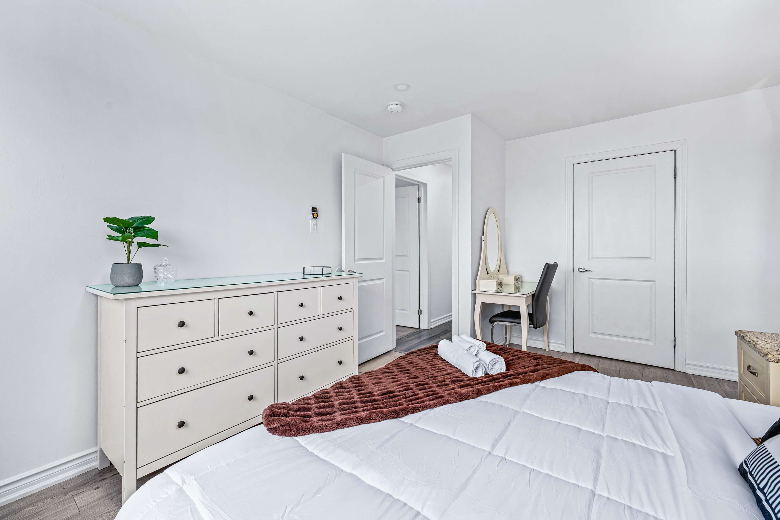Cozy bedroom with desk.