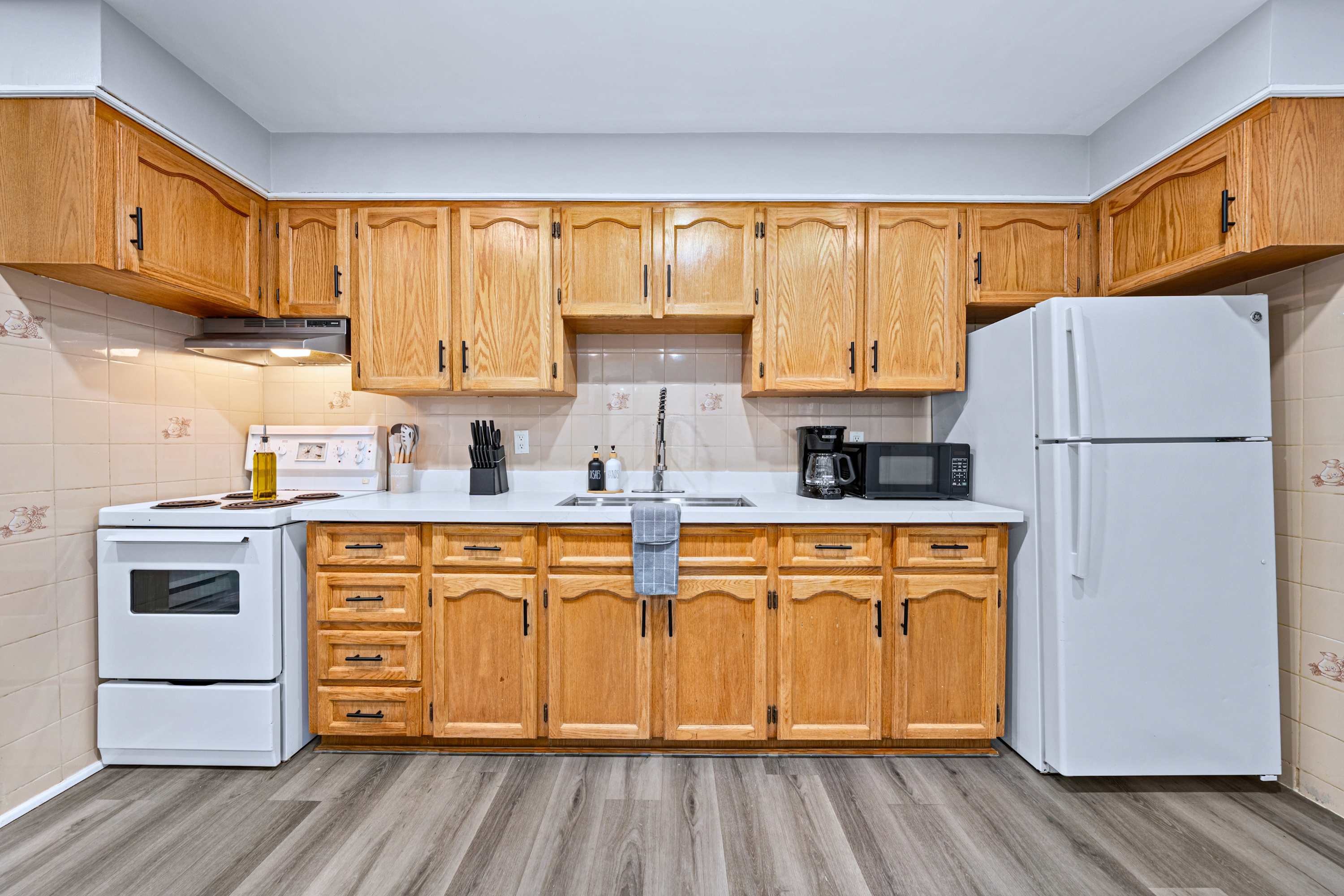 Kitchen with counter space and storage for cooking and daily meal preparation.