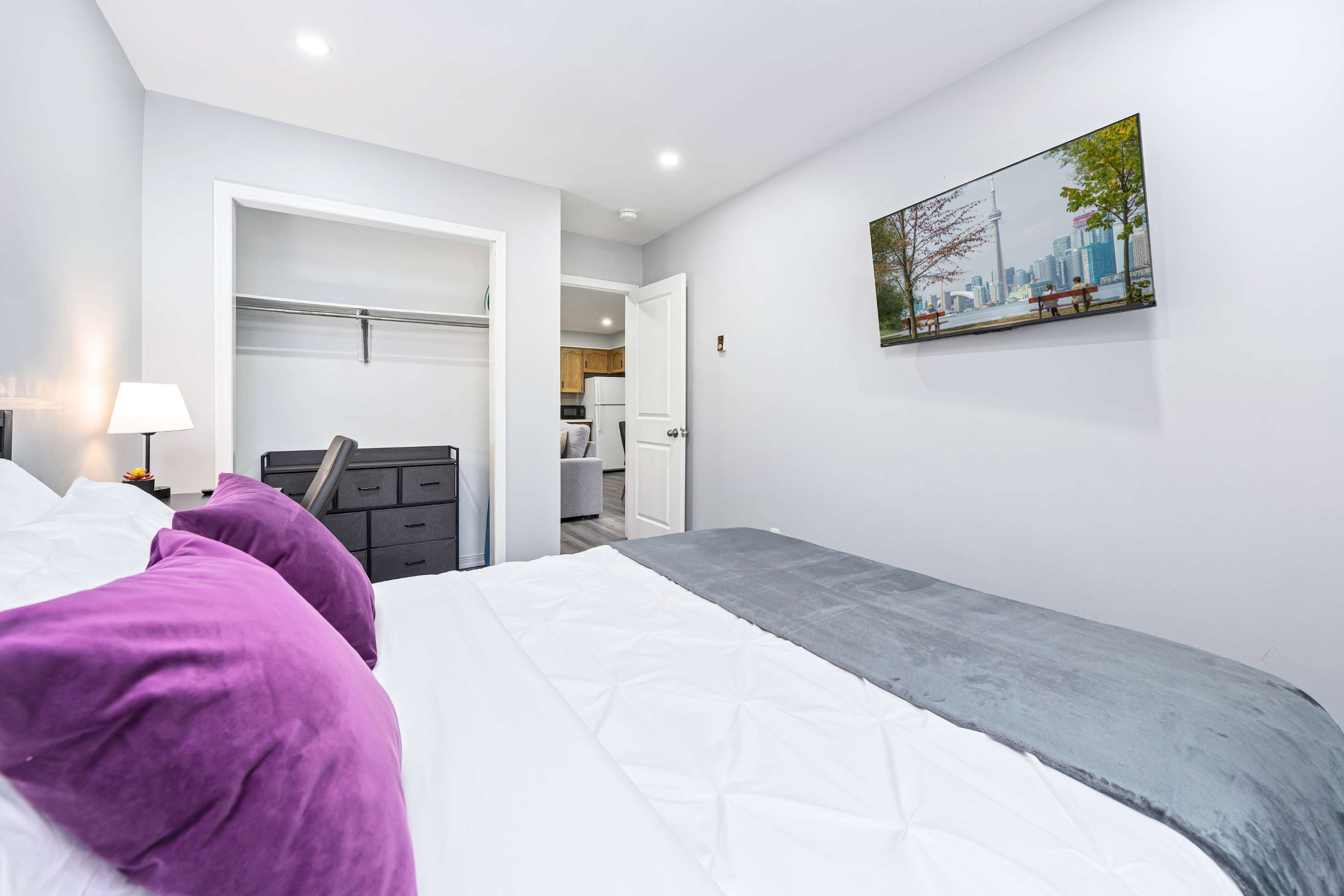 Queen bed smart TV and a custom cabinet. The perfect retreat.