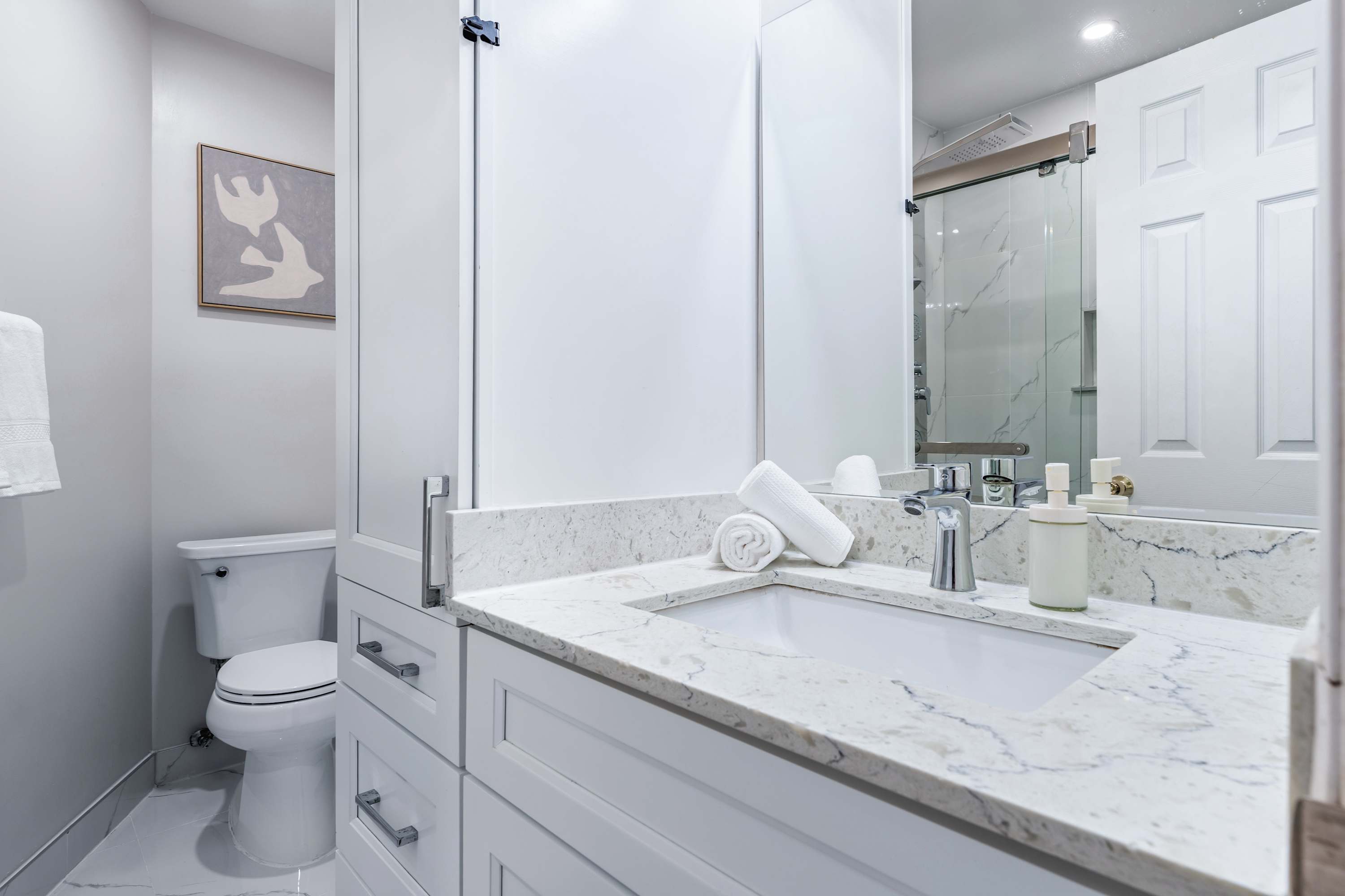 Bright bathroom with spacious vanity.