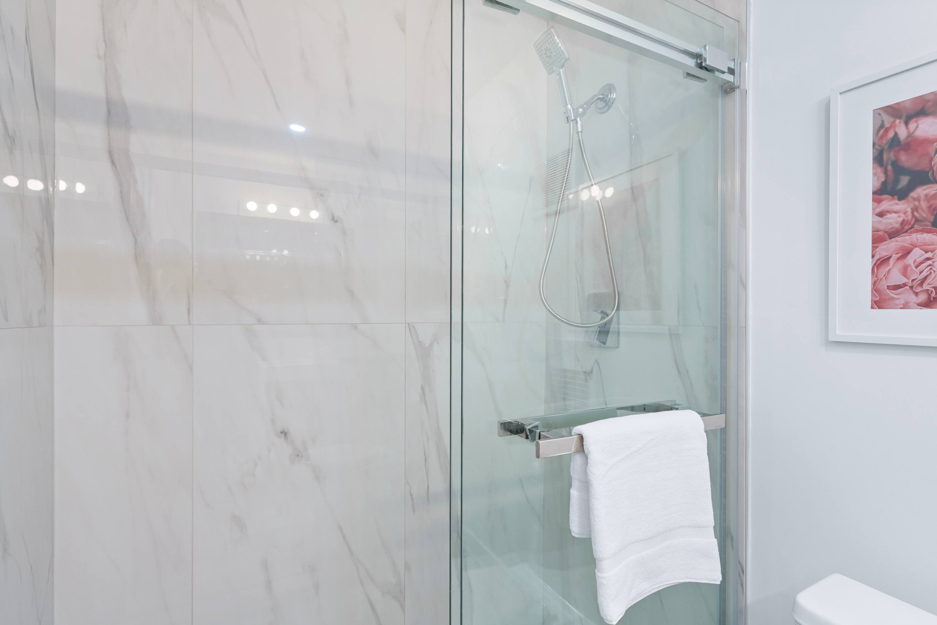 Bathroom with a walk-in shower, ready for a refreshing experience