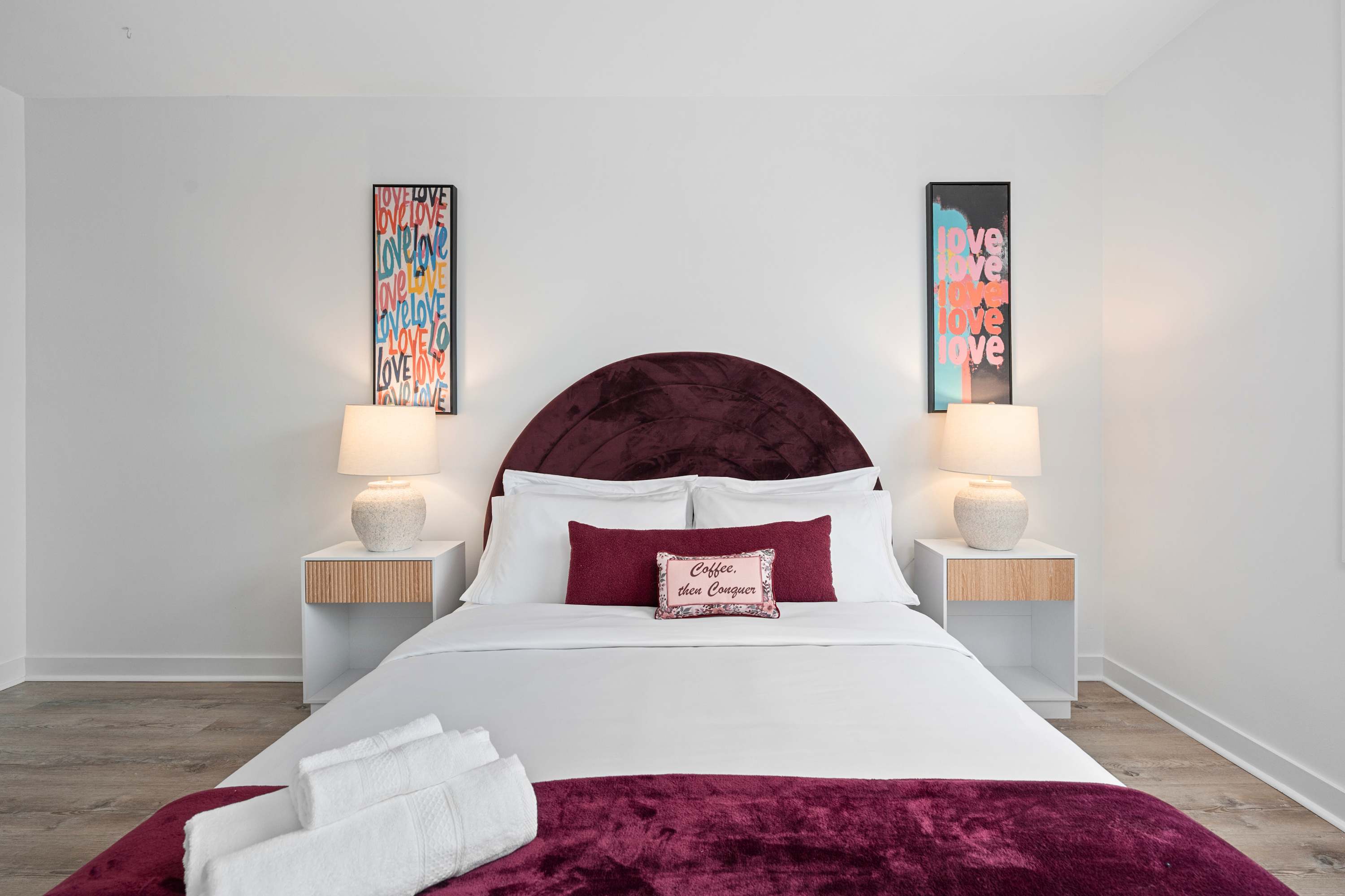 Sink into the queen bed and let the warm bedside glow set the mood.