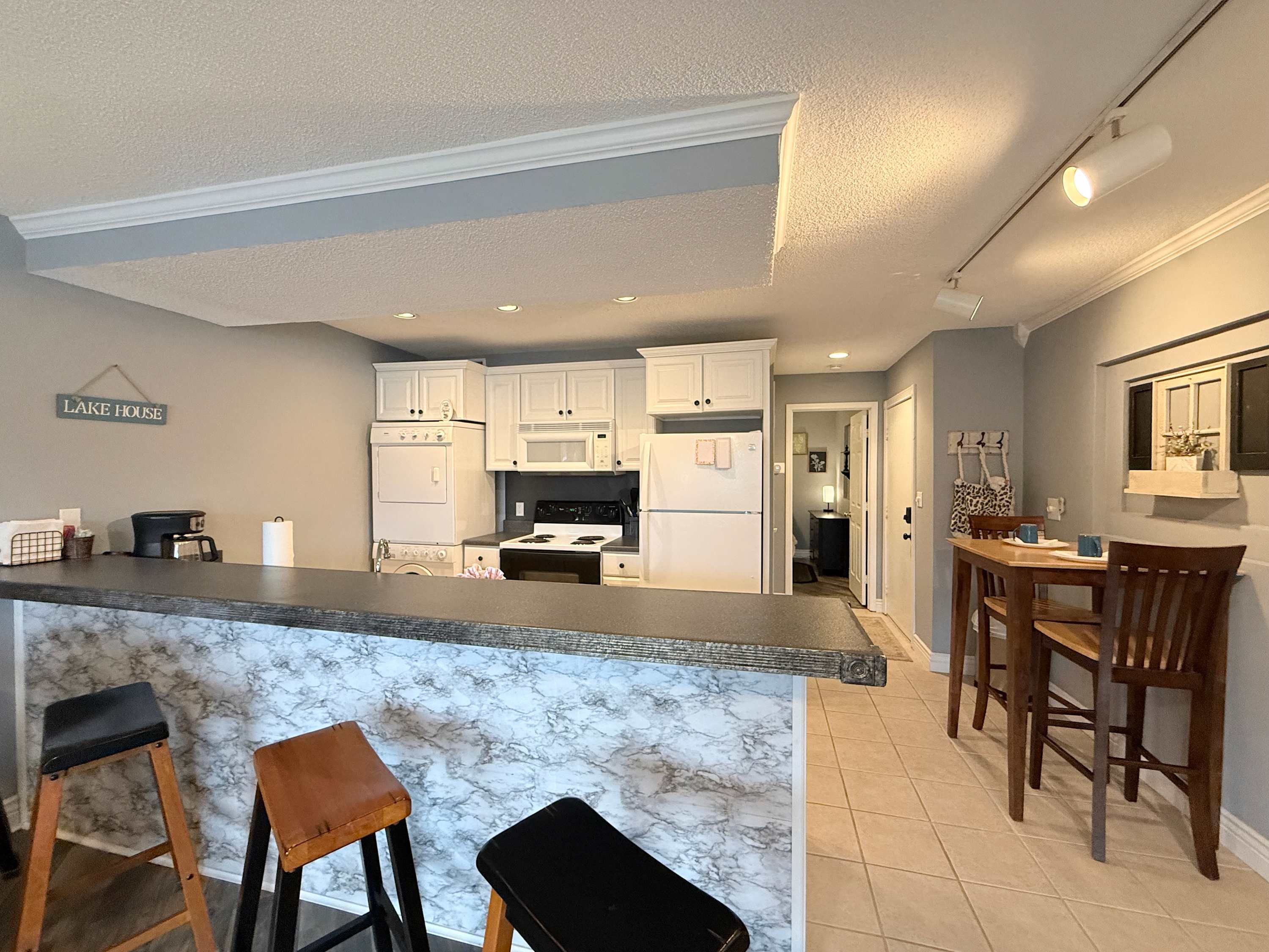 The open kitchen offers ample space & all the comforts of home​