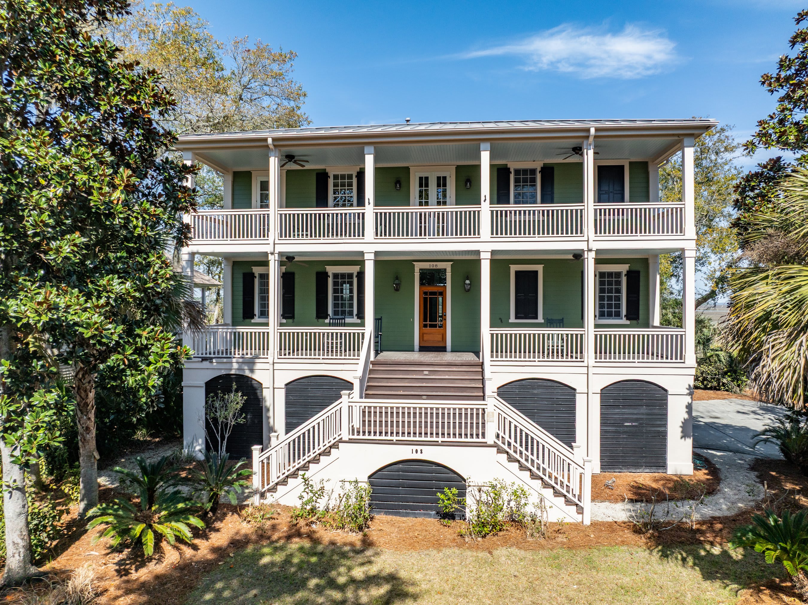 Front of the House with Several Inviting Porches