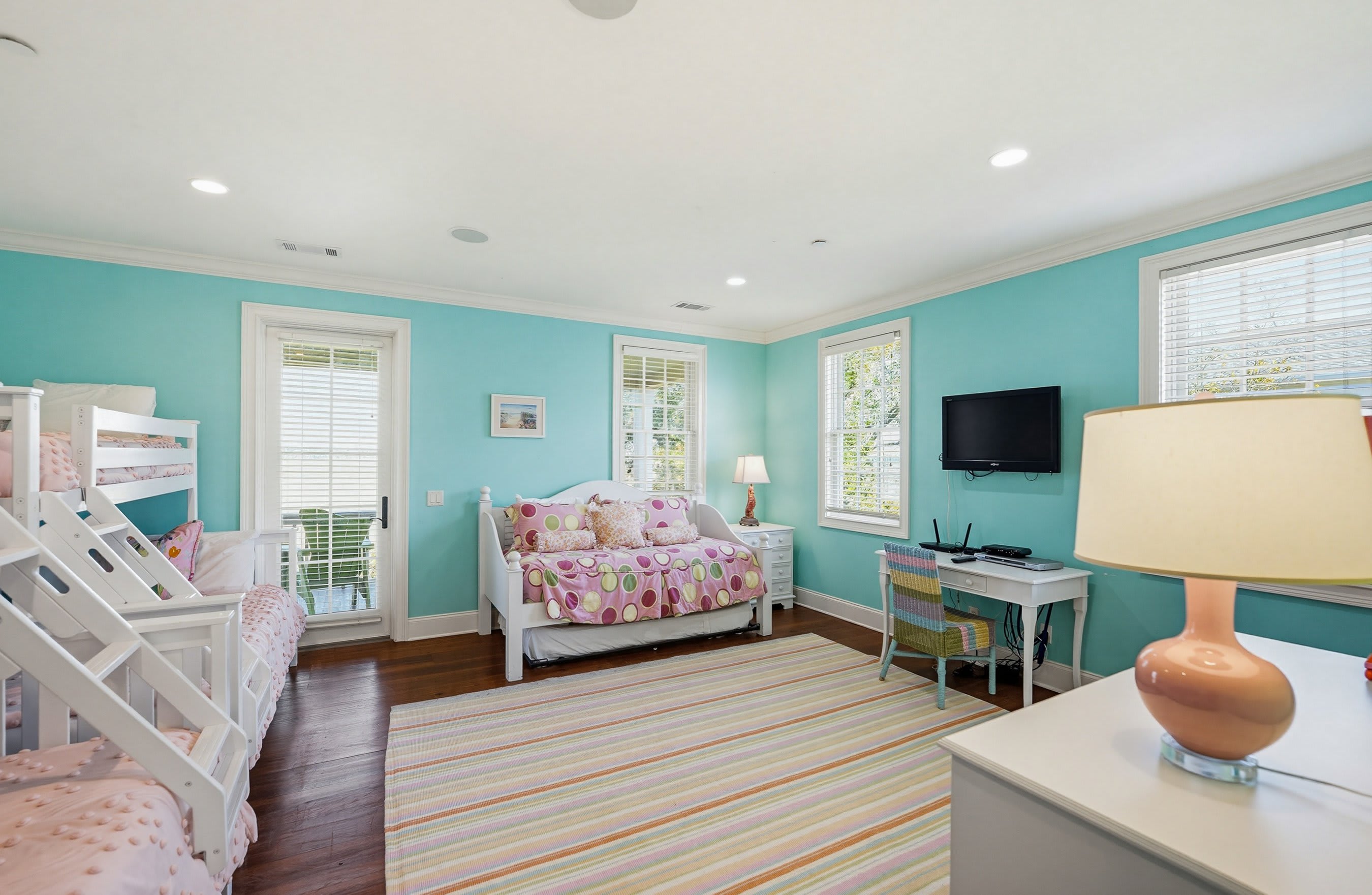 Kid's Room with 2 Bunkbeds both Twin over Double, Trundle Bed with 2 Twins, Full En Suite Bathroom and access to Back Porch