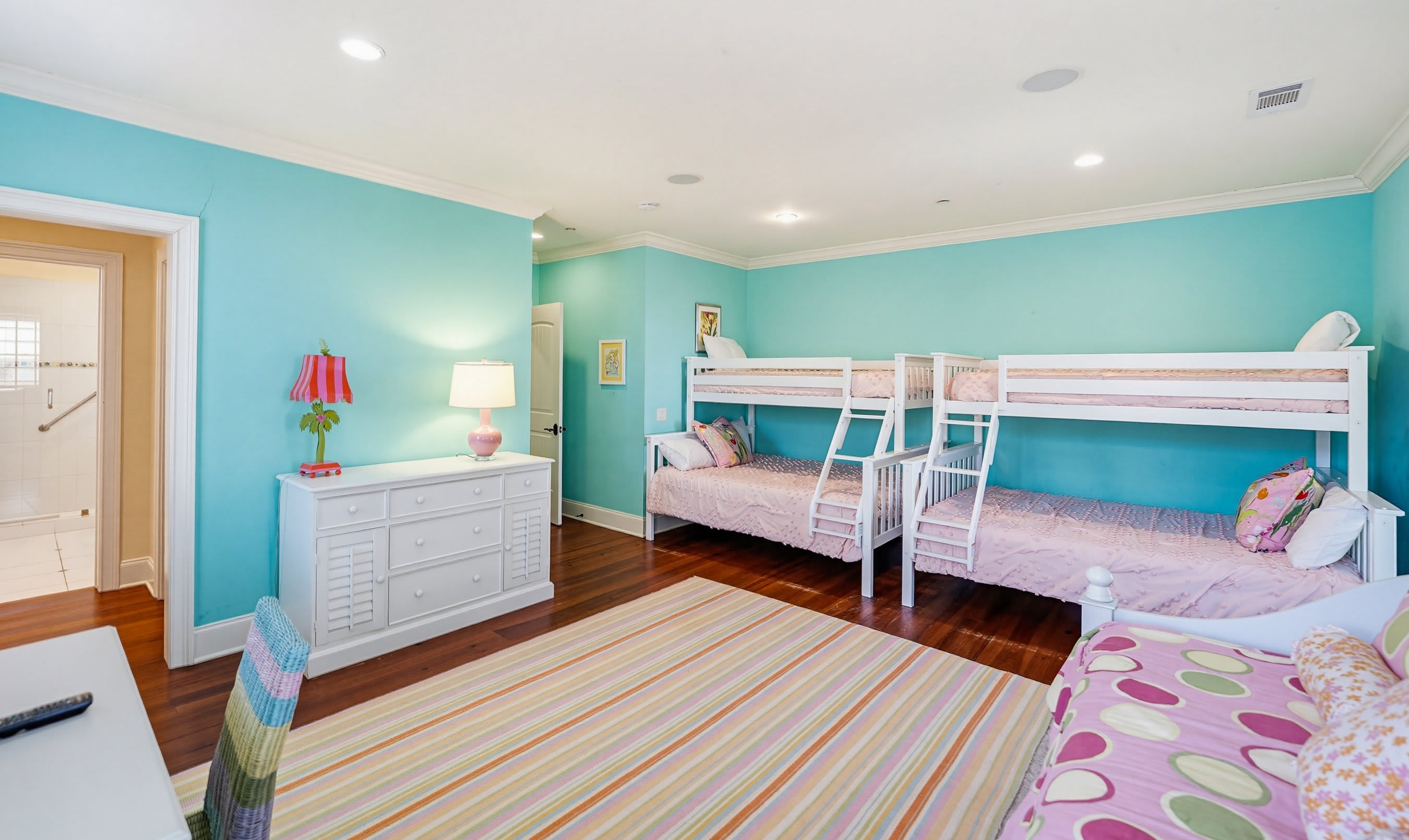 Kid's Room with 2 Bunkbeds both Twin over Double, Trundle Bed with 2 Twins, Full En Suite Bathroom and access to Back Porch