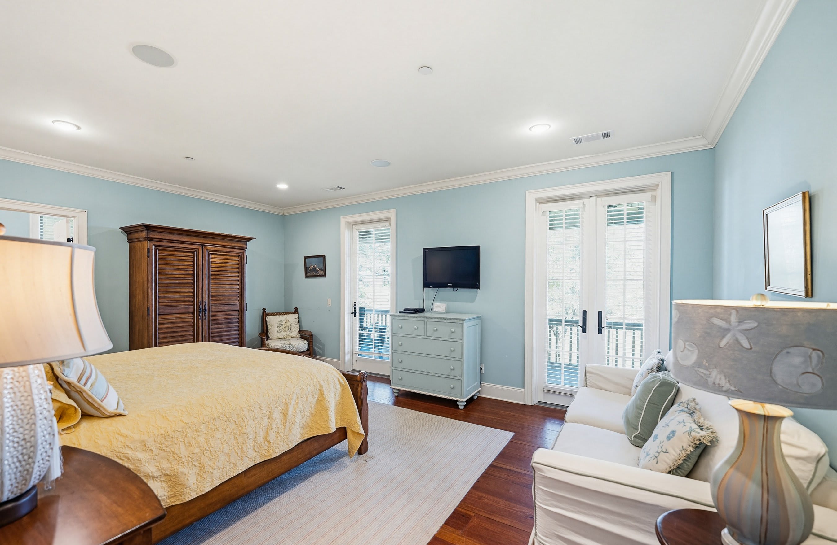 2nd Level Primary Bedroom with King Bed, Full En Suite Bathroom and Access to Back Porch