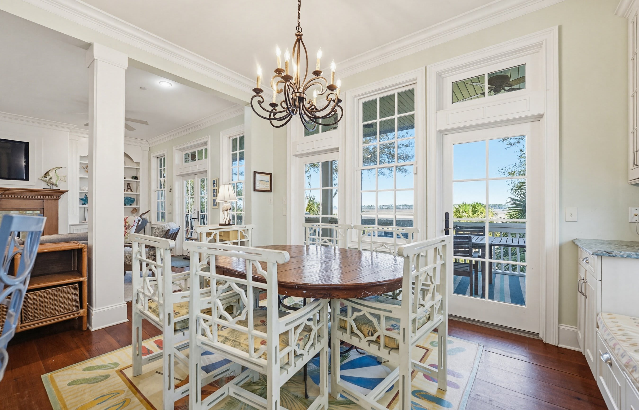 Dining Area with Access to Screened Porch with Marsh Views